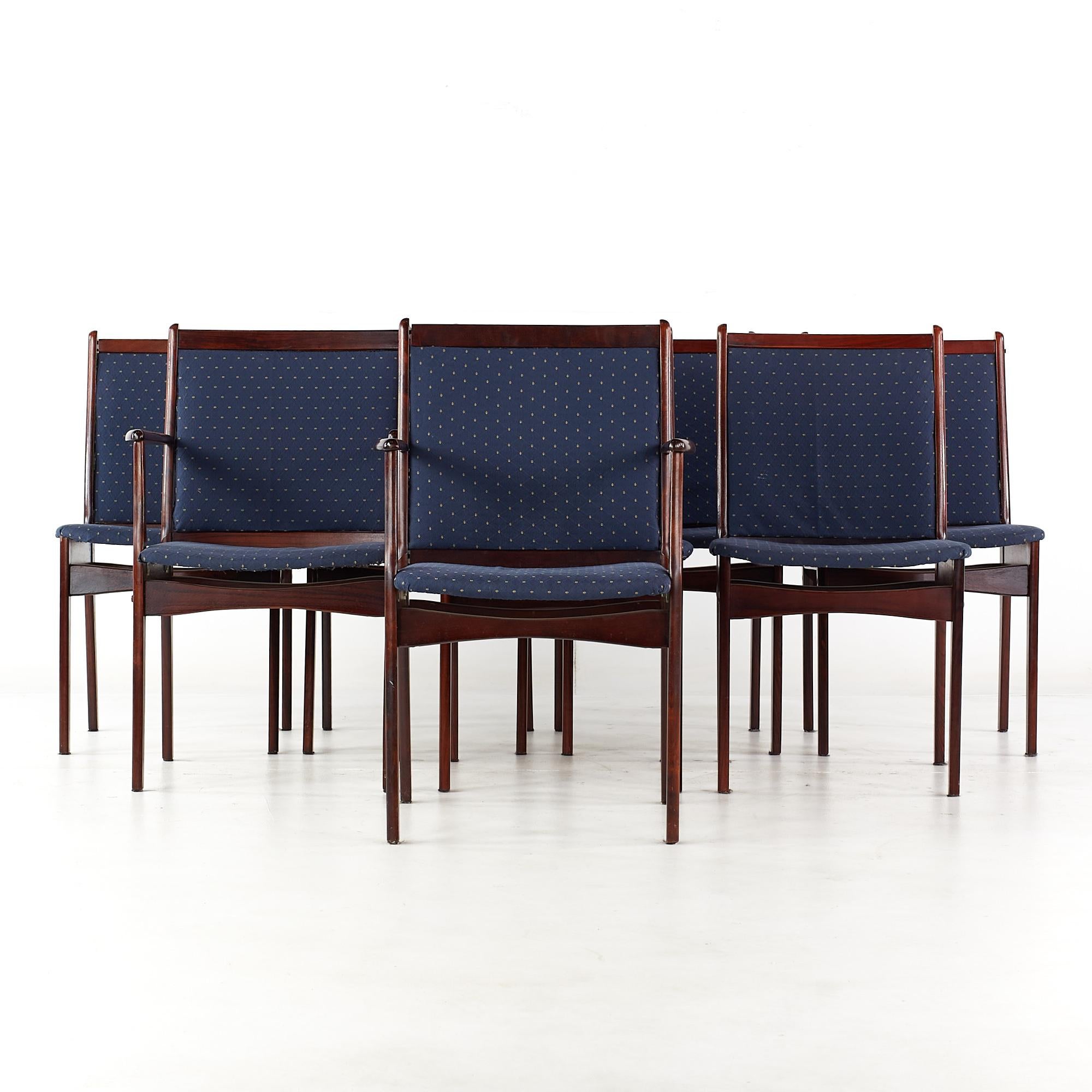 Erik Buch Style Mid Century Rosewood dining chairs - set of 8

Each armless chair measures: 19 wide x 20.5 deep x 34.5 high, with a seat height of 18 inches
Each captains chair measures: 22 wide x 21.25 deep x 34.5 high, with a seat height of 18