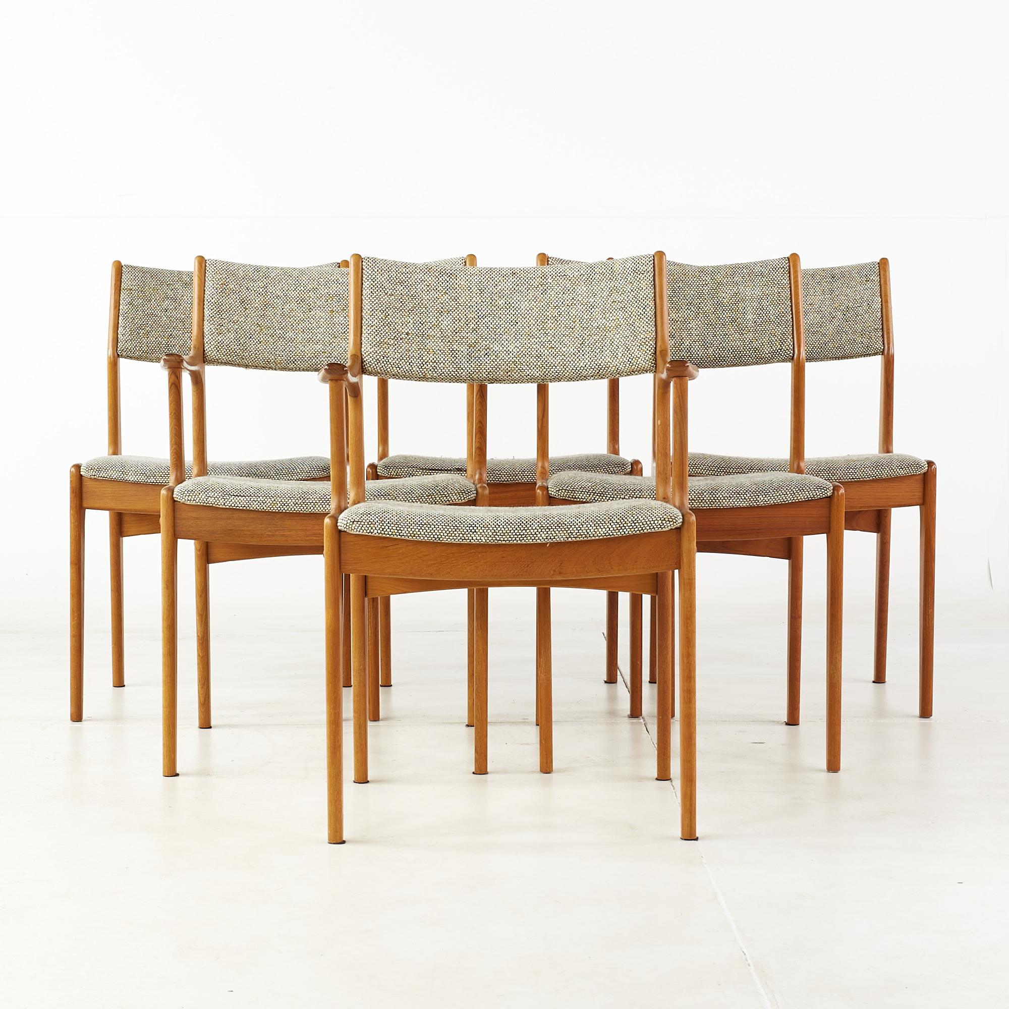 Erik Buch style mid century teak dining chairs - set of 6

Each armless chair measures: 19.5 wide x 18.5 deep x 32.5 high, with a seat height of 18 inches
Each captains chair measures: 22.5 wide x 19 deep x 32.5 high, with a seat height of 18