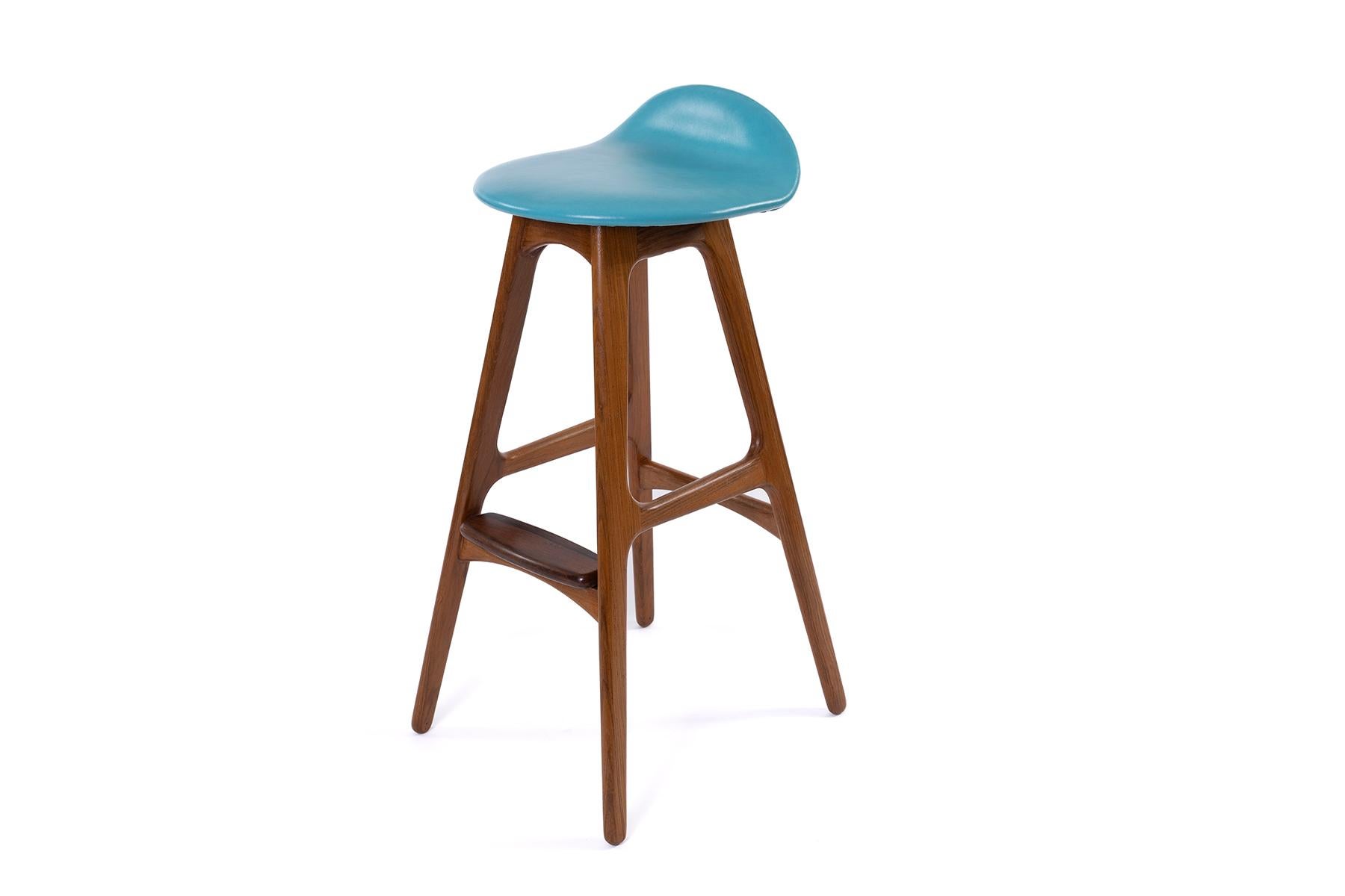 Pair of teak rosewood and leather barstools designed by Erik Buch. These sculptural examples have been newly finished and upholstered in a supple turquoise leather. Price listed is for the pair.