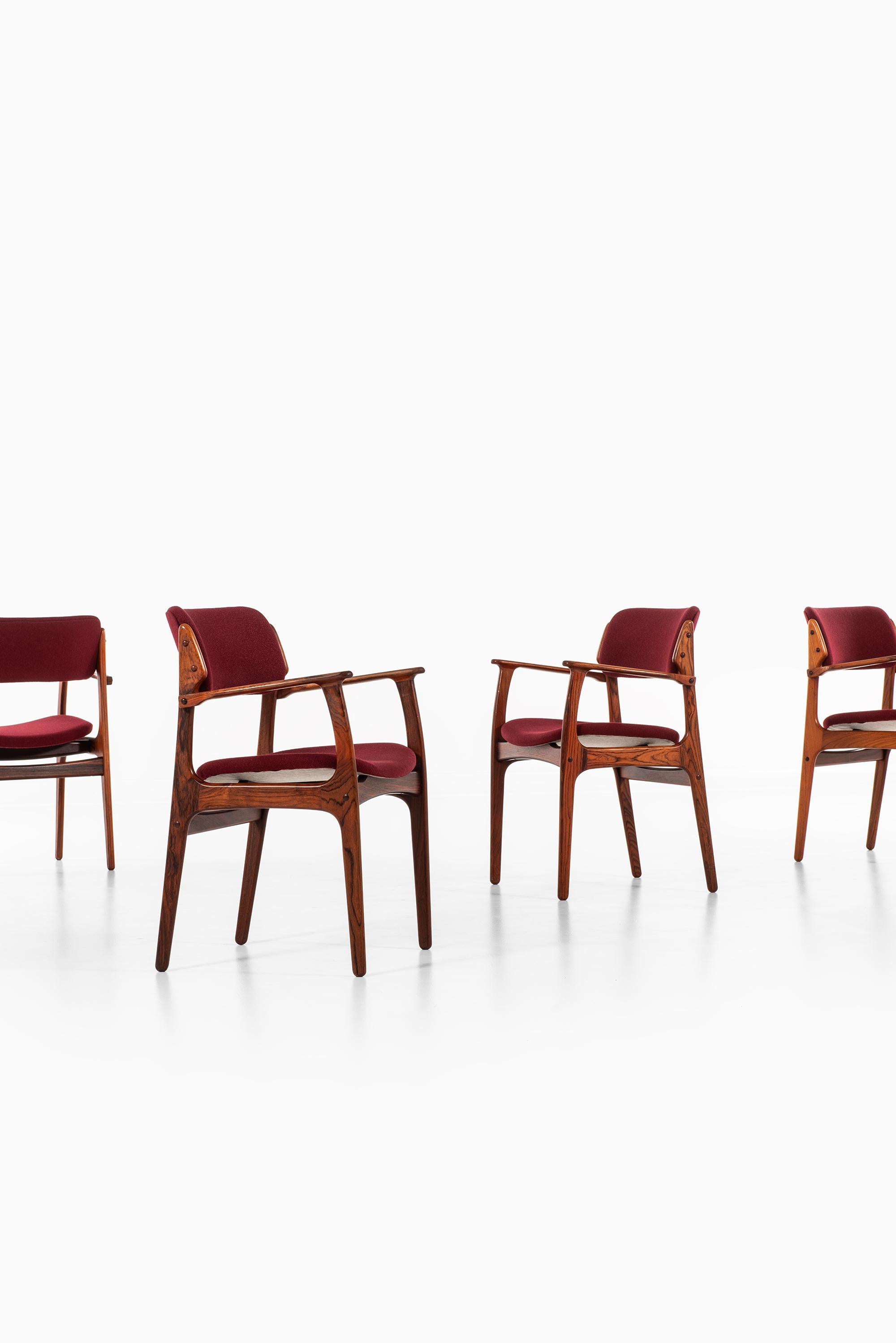 Rare set of 4 armchairs model OD-50 designed by Erik Buck. Produced by Oddense Maskinsnedkeri A/S in Denmark.