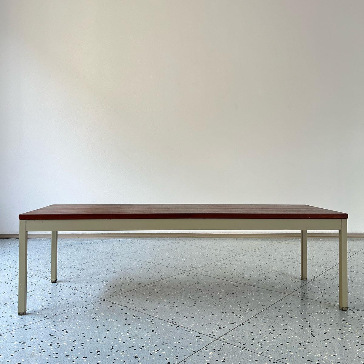 Swedish teak and metal bench or coffee table, designed by Erik Herløw and manufactured by Nordiska Kompaniet (NK) in Sweden, 1960s.

This bench comes from Nordiska Kompaniet’s Triva Modul series, which was produced by the company in the 1960s.