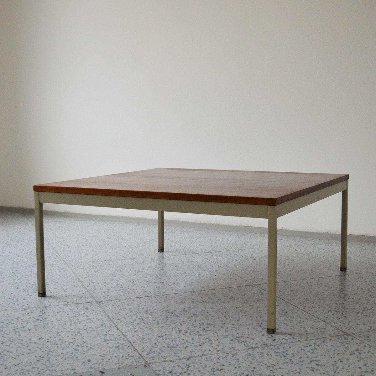 Swedish teak and metal center square coffee table, designed by Erik Herløw and manufactured by Nordiska Kompaniet (NK) in Sweden, 1960s.

This table comes from Nordiska Kompaniet’s Triva Modul series, which was produced by the company in the