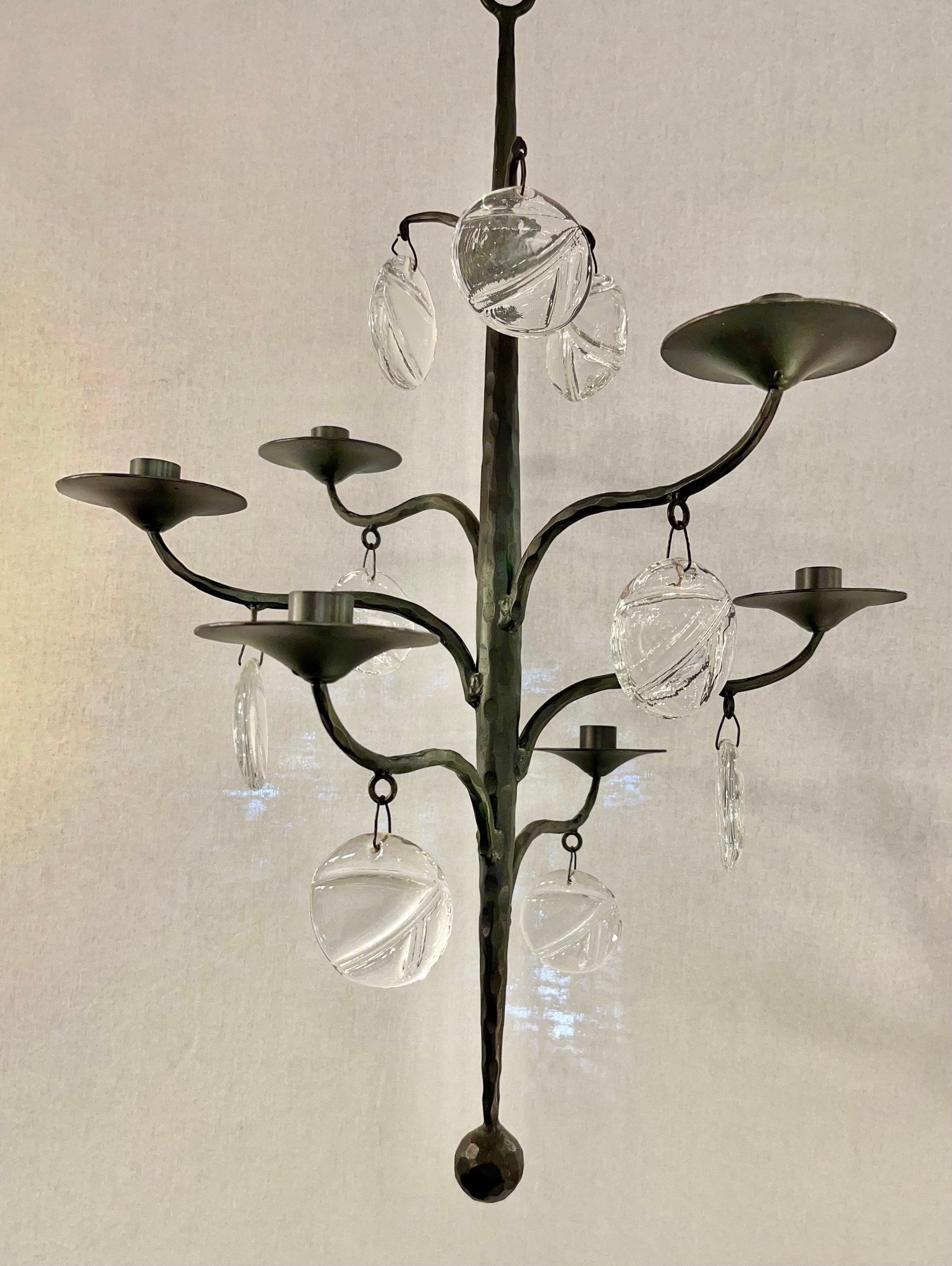 Chandelier by Erik Höglund, for 6 candles, complet and original condition, in bronze and brass. Not wired, only for candles.