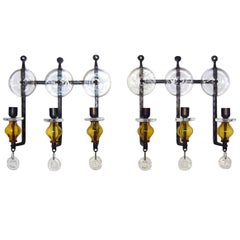 Erik Höglund for Kosta Boda, a Pair of 3-Armed Wall Candleholders in Cast Iron