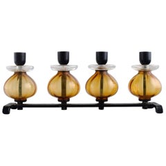 Erik Höglund for Kosta Boda, Candlestick in Cast Iron and Mouth Blown Art Glass