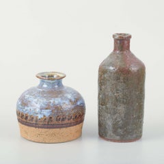 Erik Höglund for Kosta Boda. Four-armed iron candelabra with glass prisms