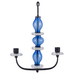 Erik Höglund, Kosta Boda. Two-armed hanging candle holder. Cast iron and glass