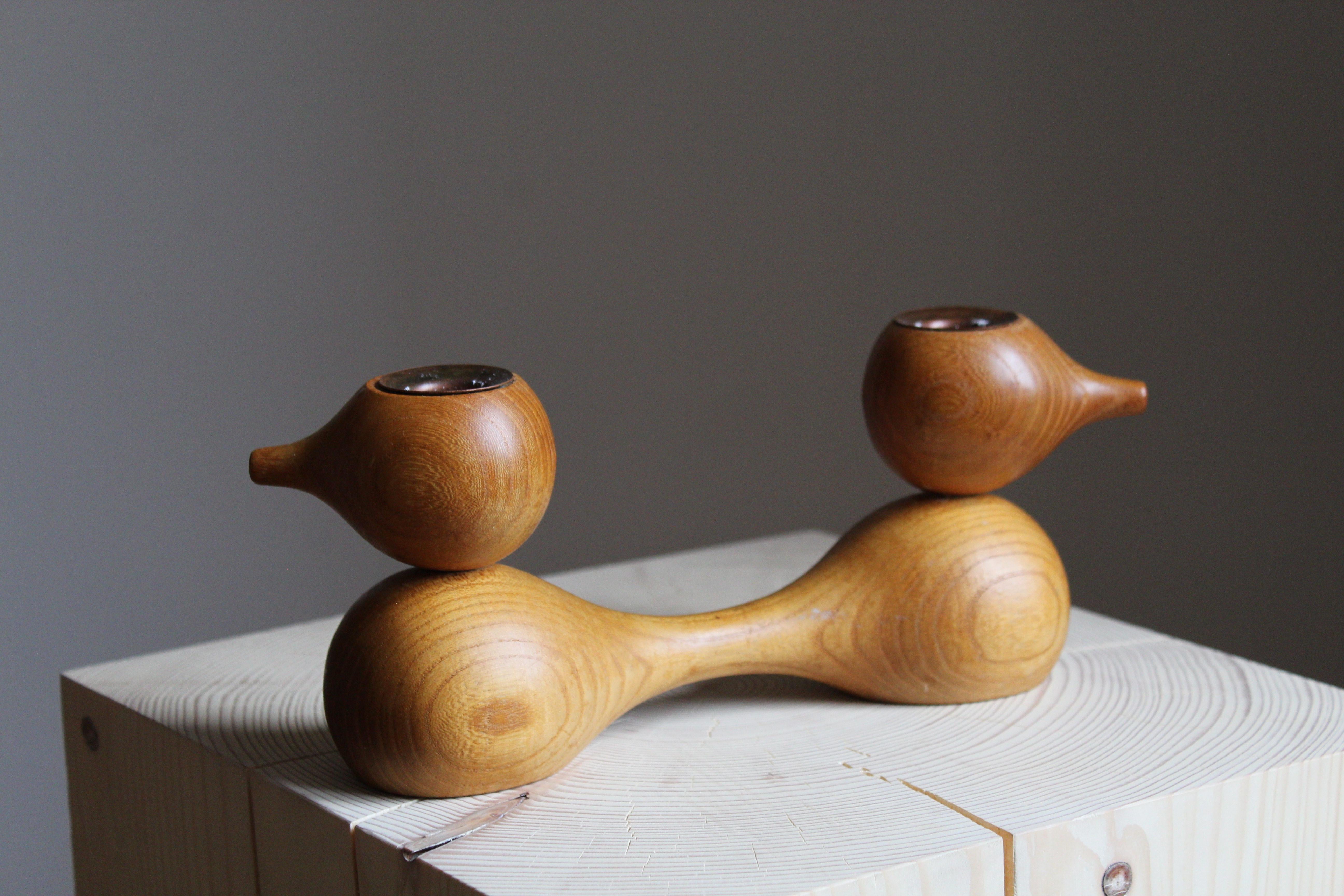 A sculptural and organic candleholder / candlestick. Designed and produced by Erik Höglund. Labeled. Sweden, 1960s.
  