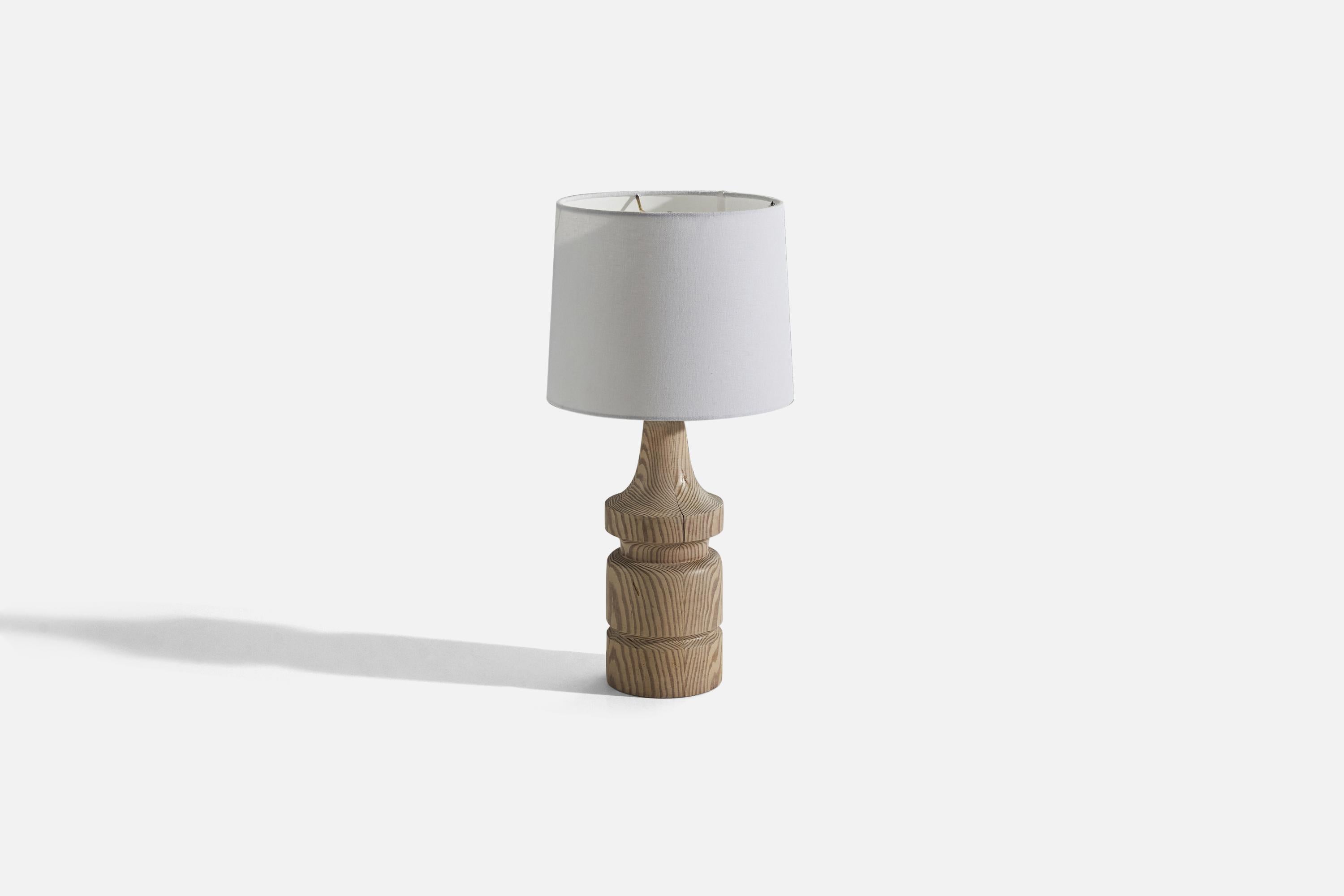 A cerused pine table lamp designed and produced by Erik Höglund, Sweden, 1960s. 

Sold without lampshade. 
Dimensions of Lamp (inches) : 16 x 5 x 5 (H x W x D)
Dimensions of Shade (inches) : 9 x 10 x 8 (T x B x S)
Dimension of Lamp with Shade