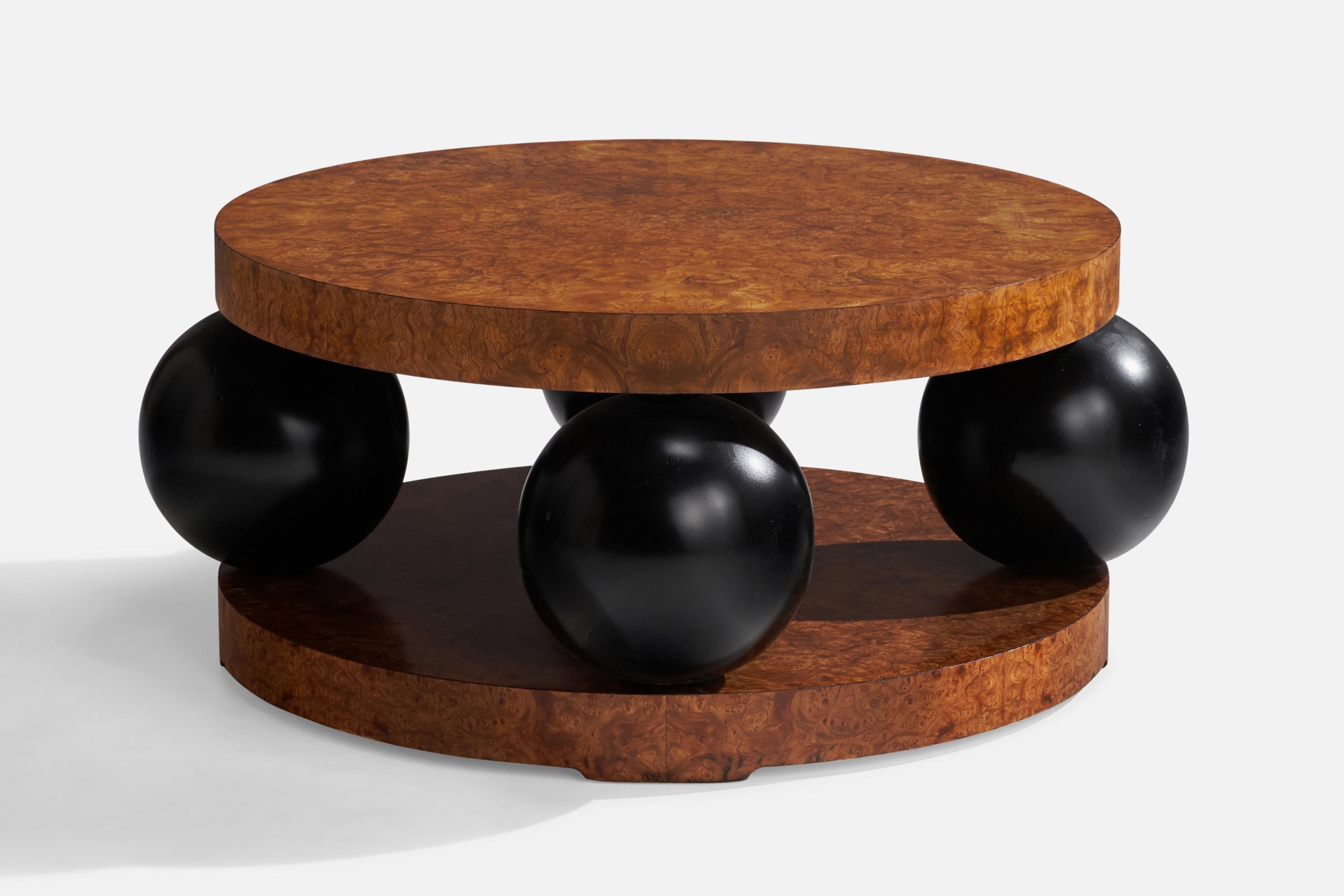A sizeable black-lacquered wood and burl wood coffee table designed by Erik 