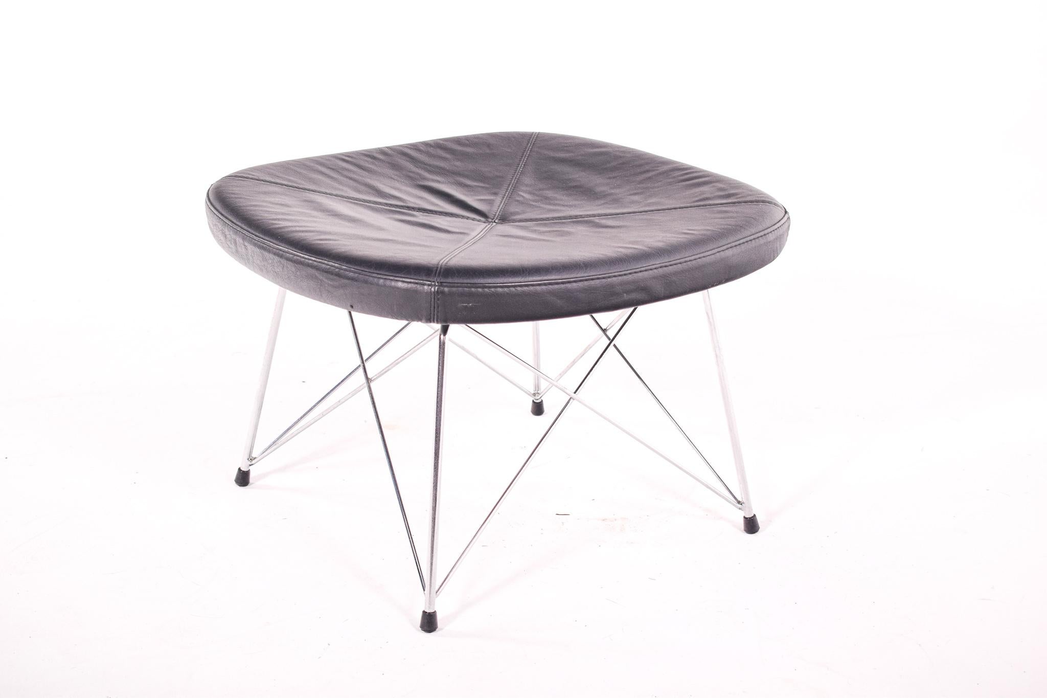 Elegant stool/bench, model EJ 141 designed by Morten Ernst & Anne Mette Jensen for Erik Jørgensen, Denmark. It's a bench with legs made of chrome-plated and upholstered seat in black leather.