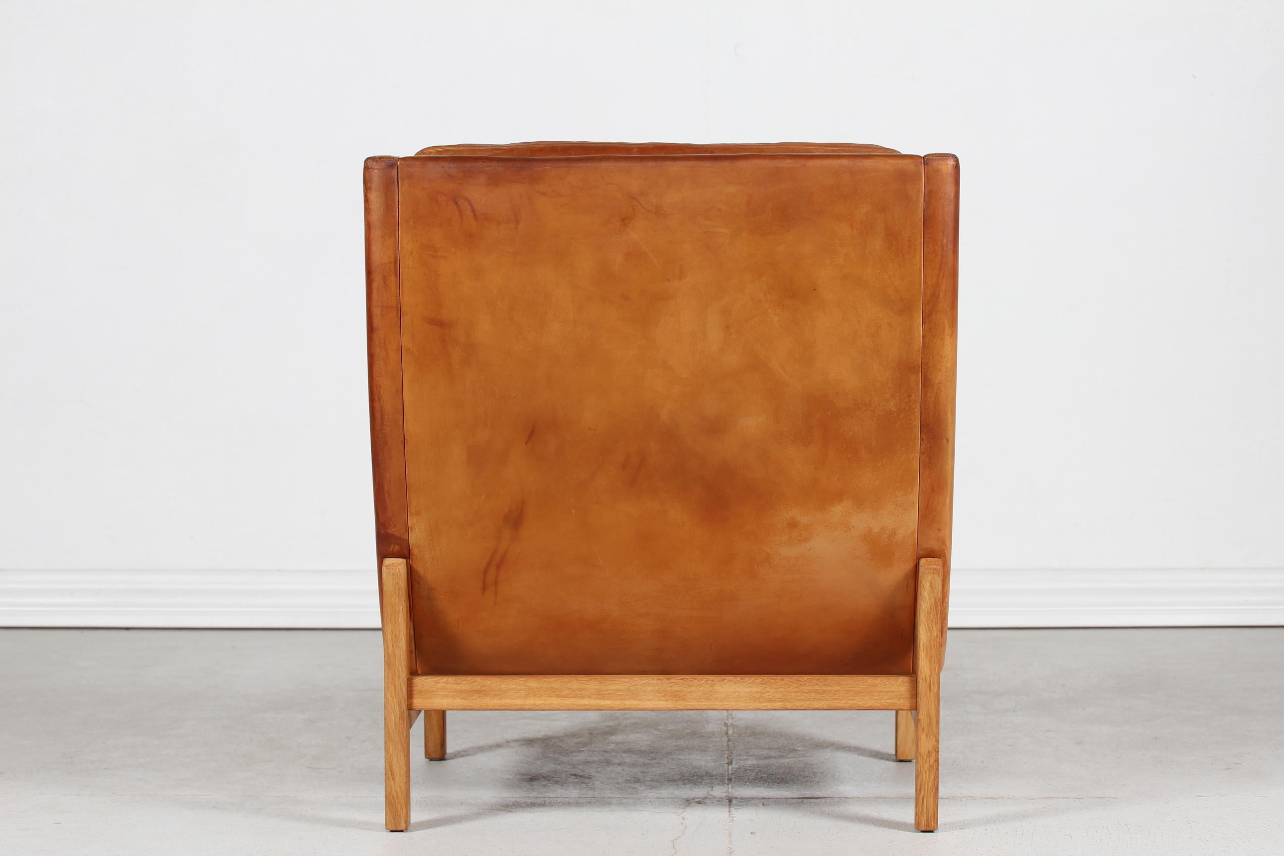Mid-Century Modern Erik Jørgensen Lounge Chair with Cognac Colored Patinated Leather Denmark 1970s