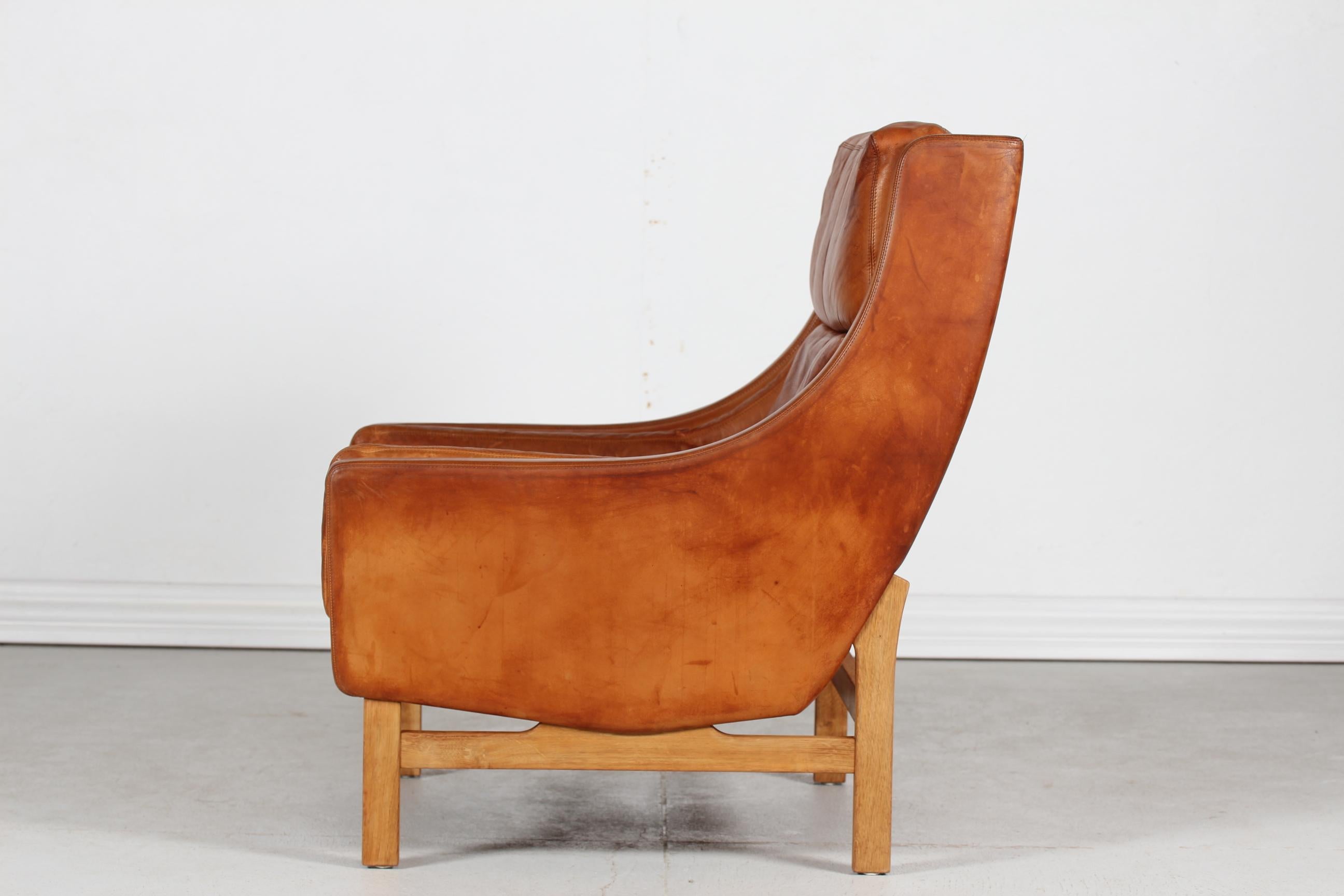Danish Erik Jørgensen Lounge Chair with Cognac Colored Patinated Leather Denmark 1970s