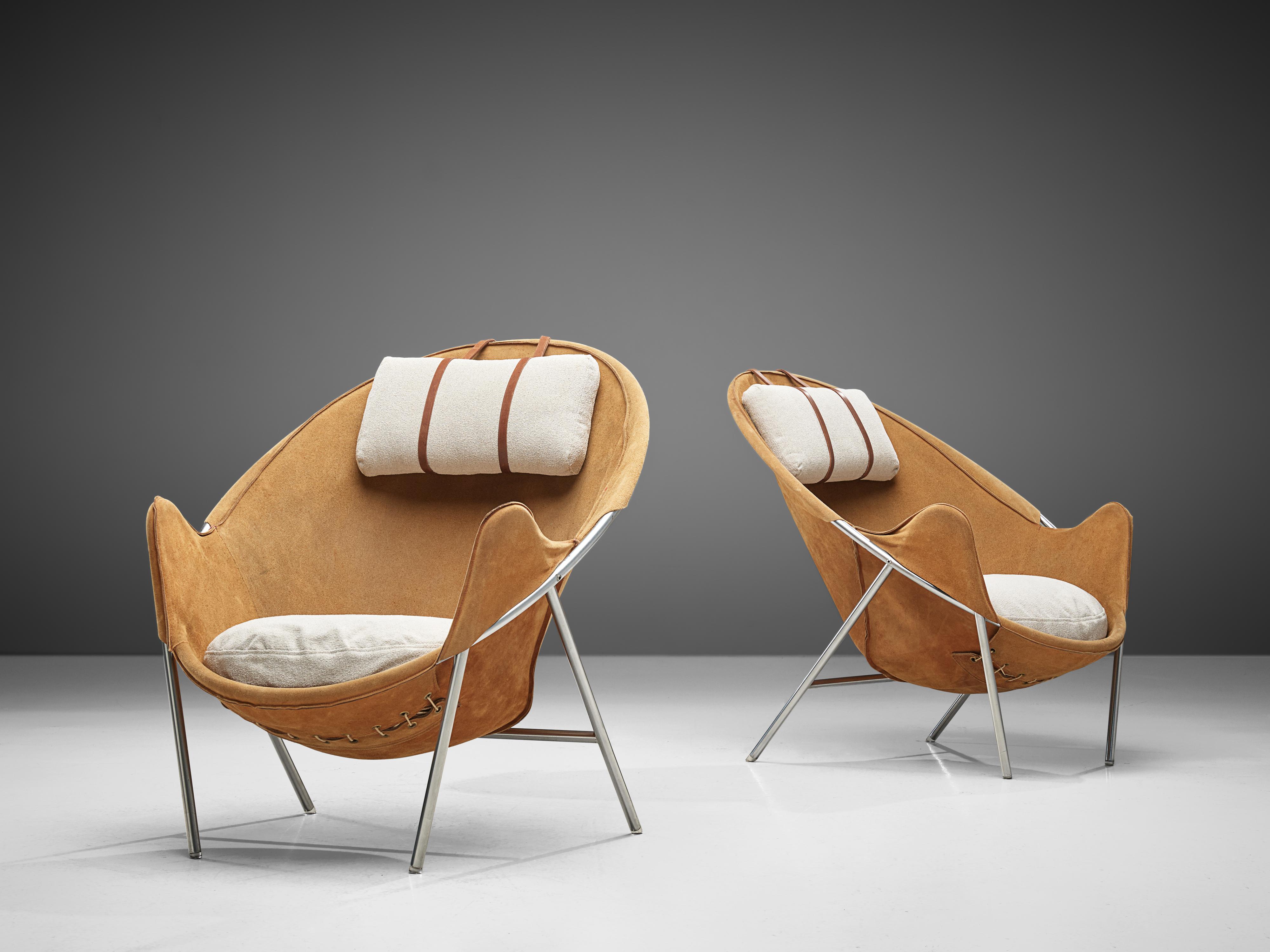 Erik Jørgensen, pair of lounge chairs, metal, suede, fabric, wood, Denmark, design 1953

This set of two easy chairs is executed in cognac suede. These sling chairs consist of a chromed tubular frame in a round shape. To increase the comfort,