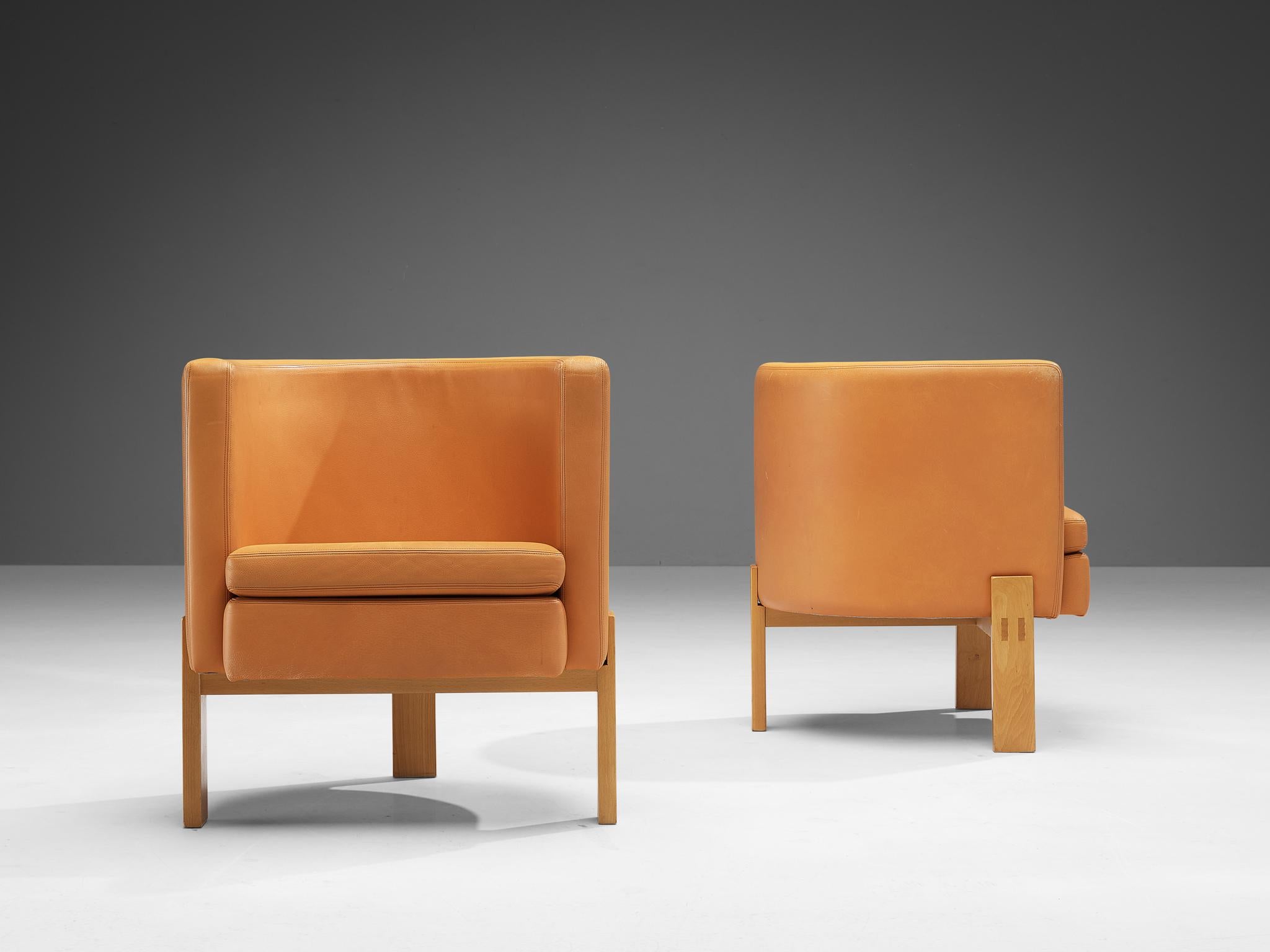 Mid-20th Century Erik Karlström for Källemo Pair of 'Club' Easy Chairs in Caramel Leather