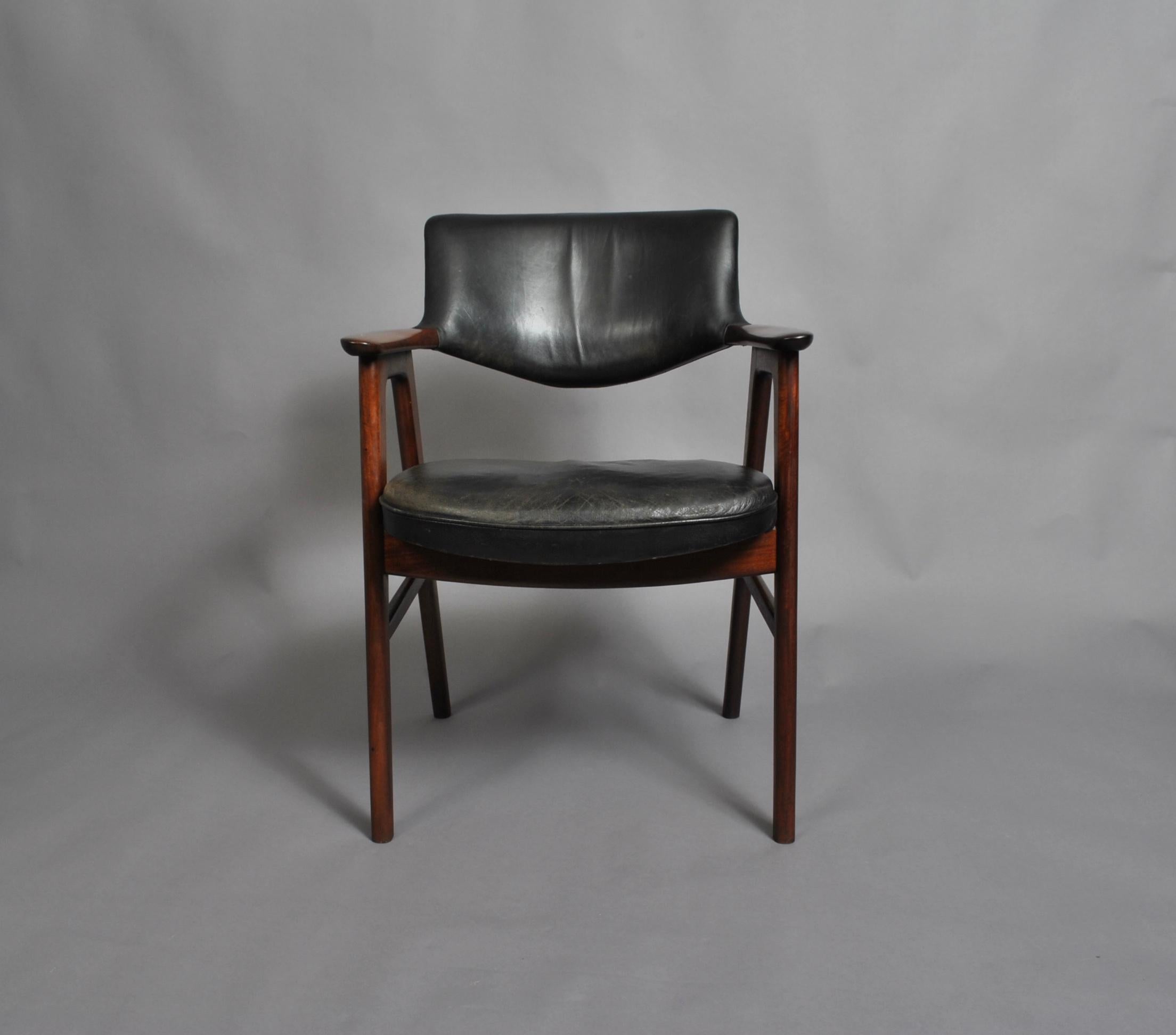 A lovely example of the Erik Kirkegaard armchair for Hong-Stole, Denmark, circa 1950.
Beautiful grained wood frame with original black leather upholstery. Custom reupholstery is available. Incredibly comfortable.