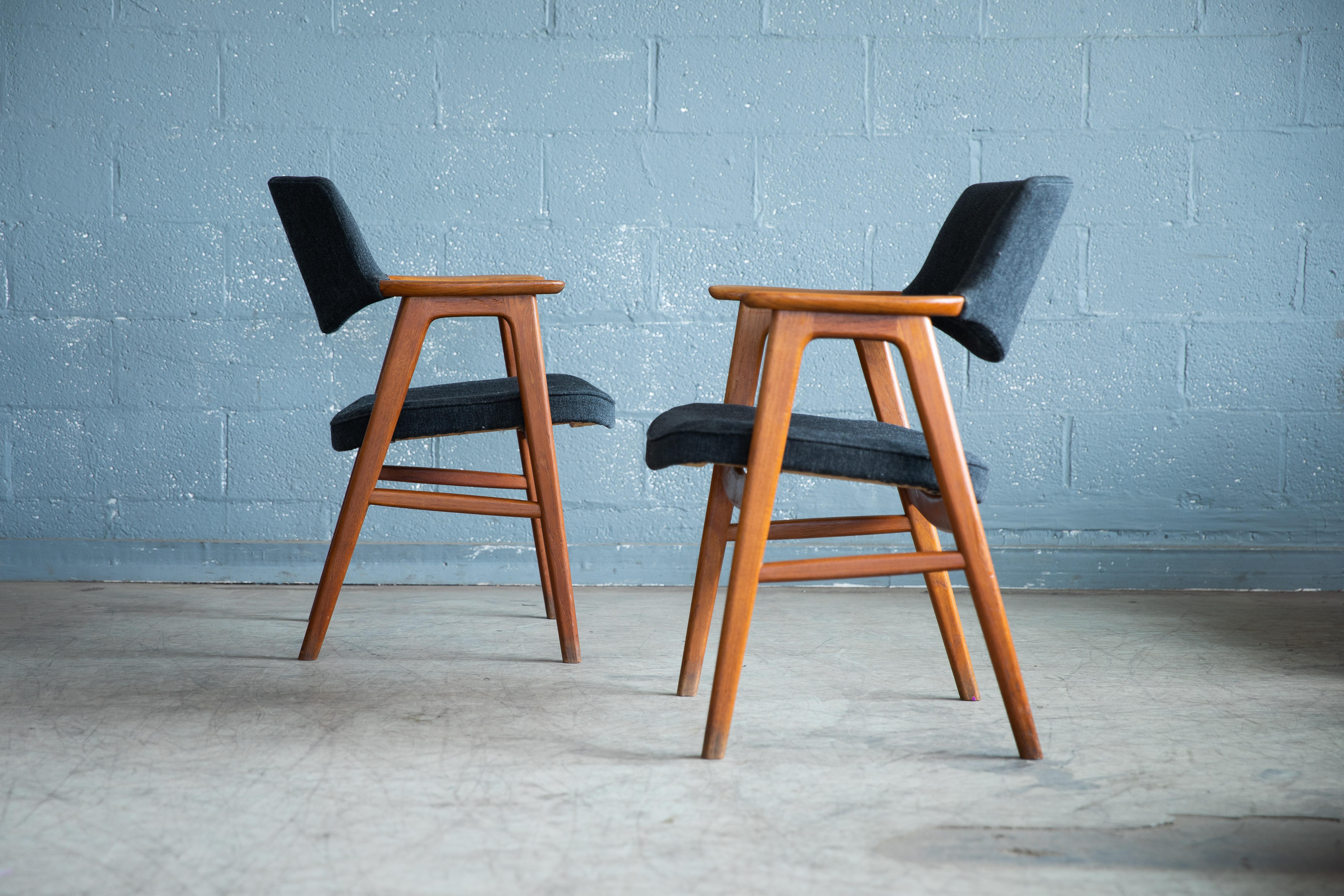 Fantastic pair set of two armchairs or desk chairs designed by Erik Kirkegaard in the 1950 for Høng Stolefabrik in Denmark. Very sought after and increasingly rare to find perfect accent chairs or desk chairs for any modern home. Made of solid teak.