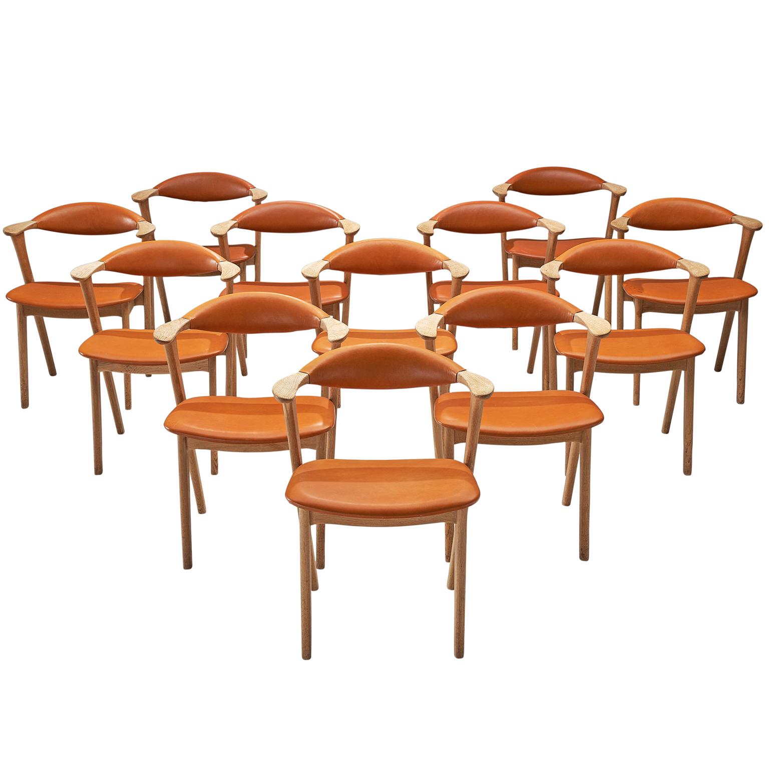 Erik Kirkegaard Set of Twelve Oak and Leather Chairs
