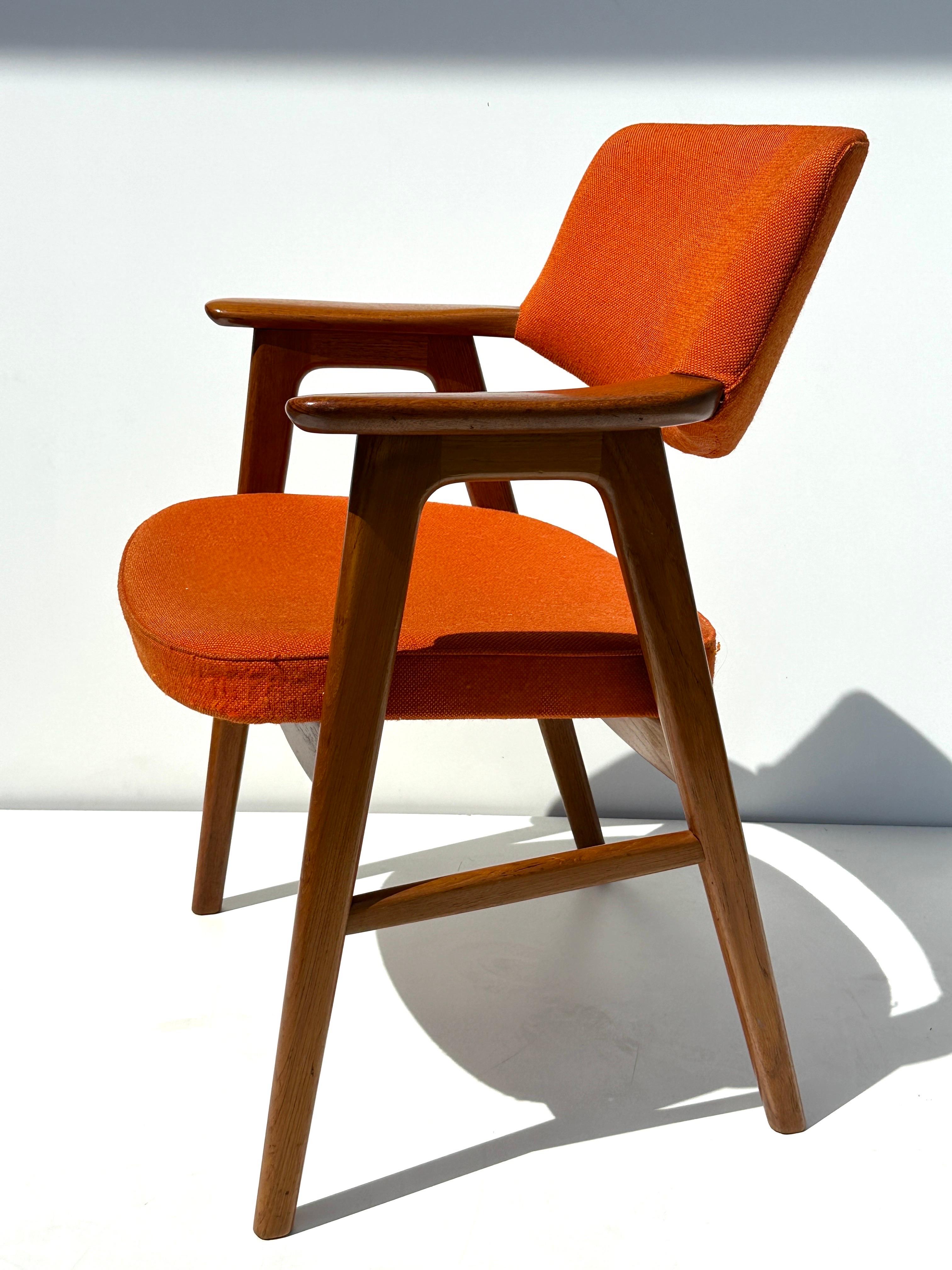 Erik Kirkegaard teak armchair in burnt orange fabric. Upholstery needed steam cleaning of probably reupholstering.