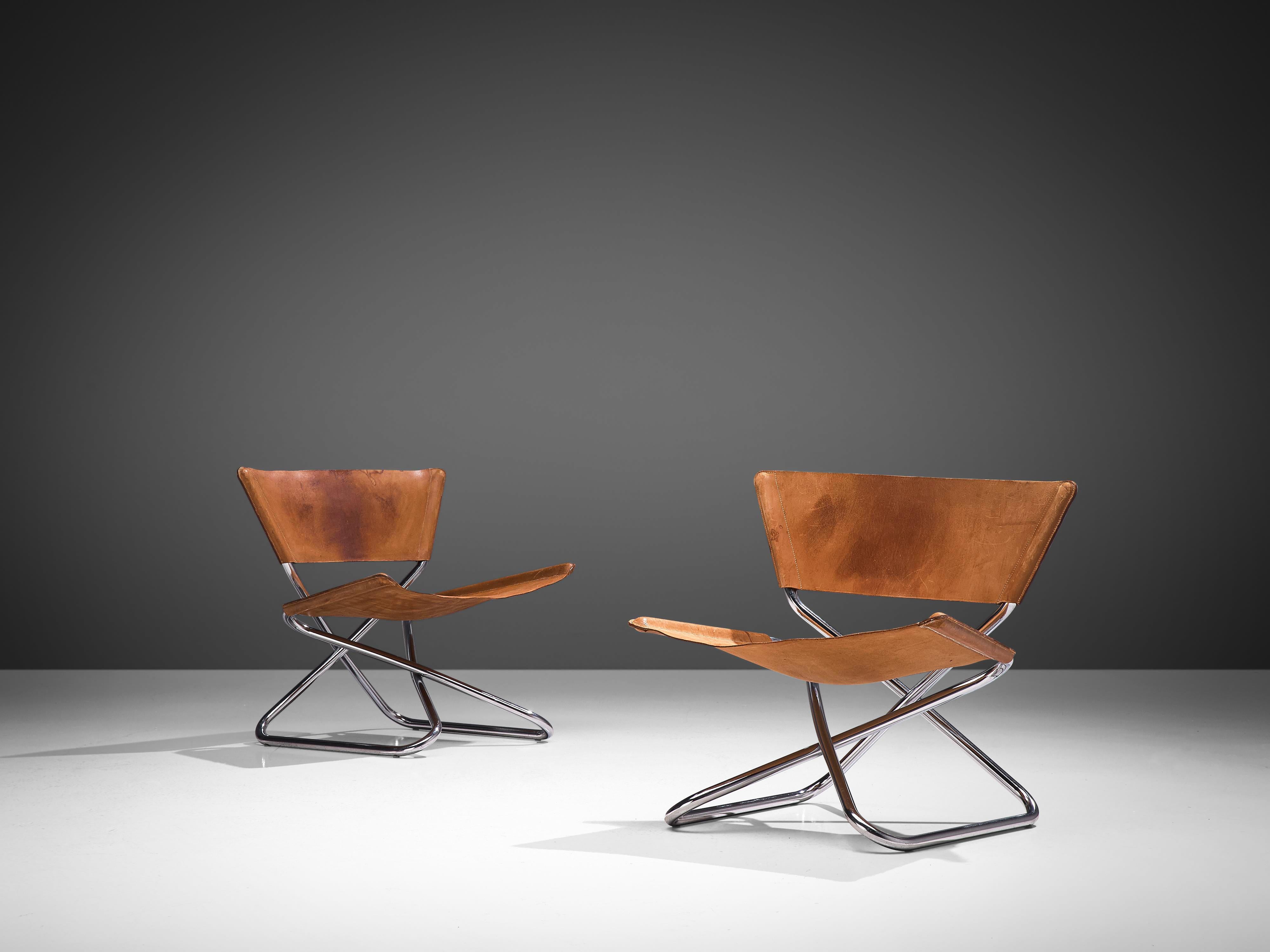 Erik Magnussen for Torben Ørskov, pair of 'Z' easy chairs, leather and chromed steel, Denmark, 1960s.

Pair of Scandinavian Modern 