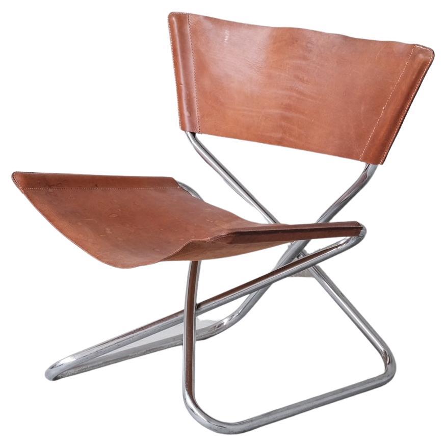 Erik Magnussen fauteuil de salon mi-sicle en cuir et acier avec structure en z