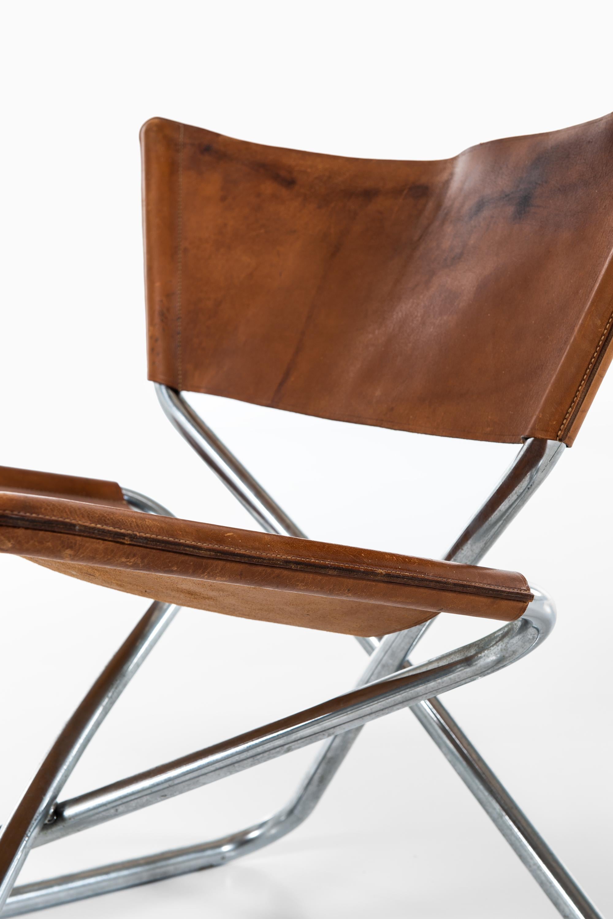 Rare pair of Z easy chairs designed by Erik Magnussen. Produced by Torben Ørskov in Denmark.