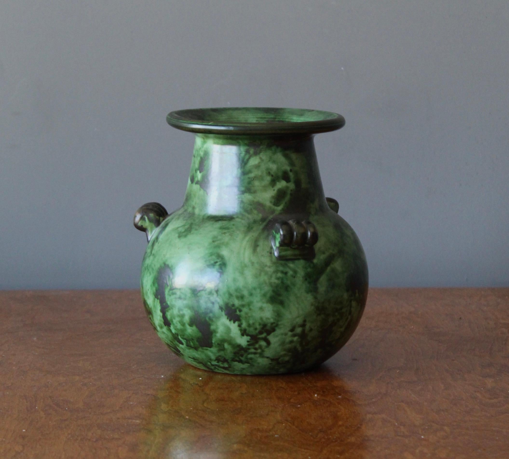 A rare ceramic vase by Erik Mornils for Nittsjö. Produced in Sweden, 1940s. Signed. 

 