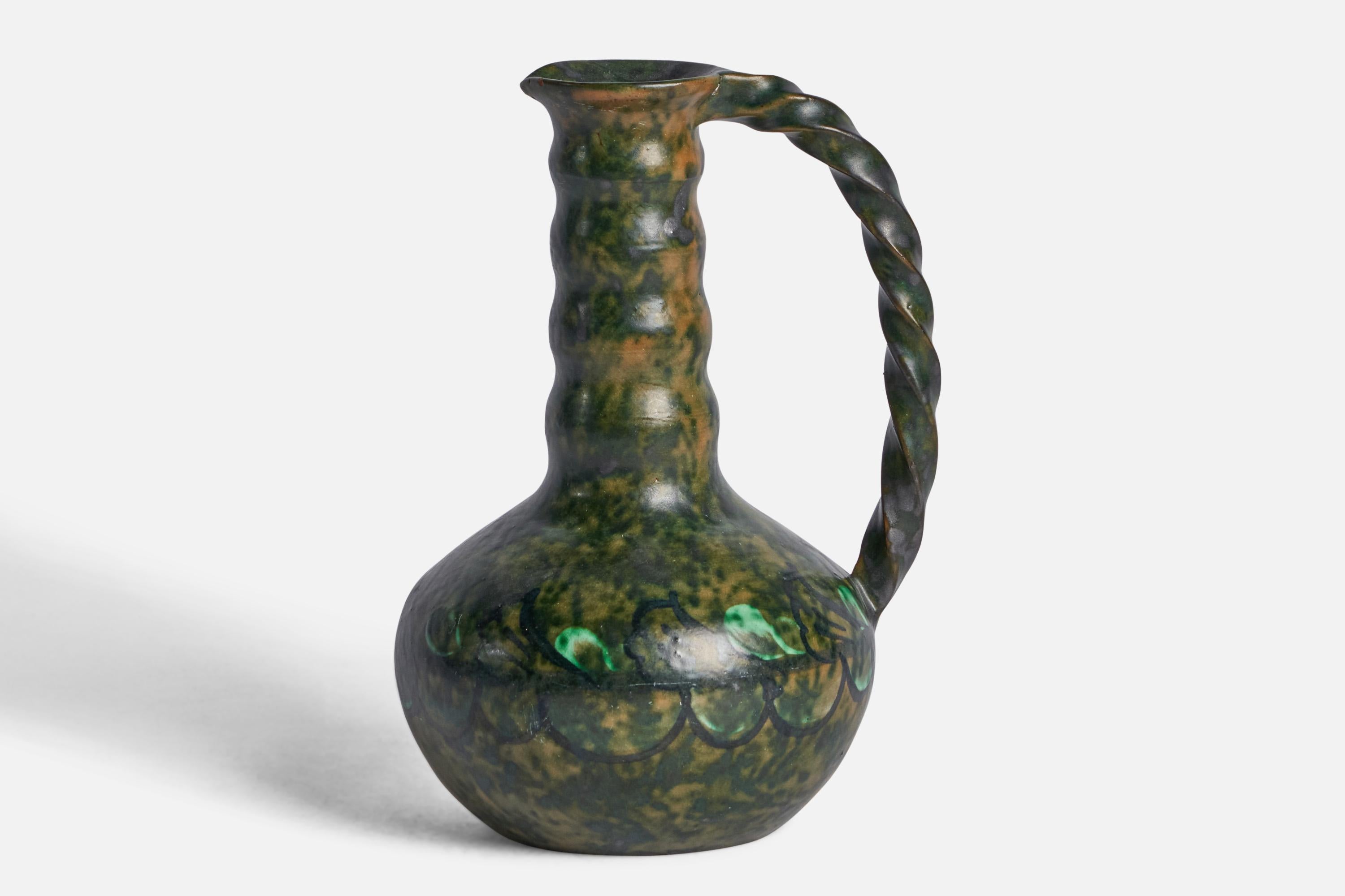 A green-glazed earthenware pitcher designed by Erik Mornils and produced by Nittsjö, Sweden, c. 1930s.