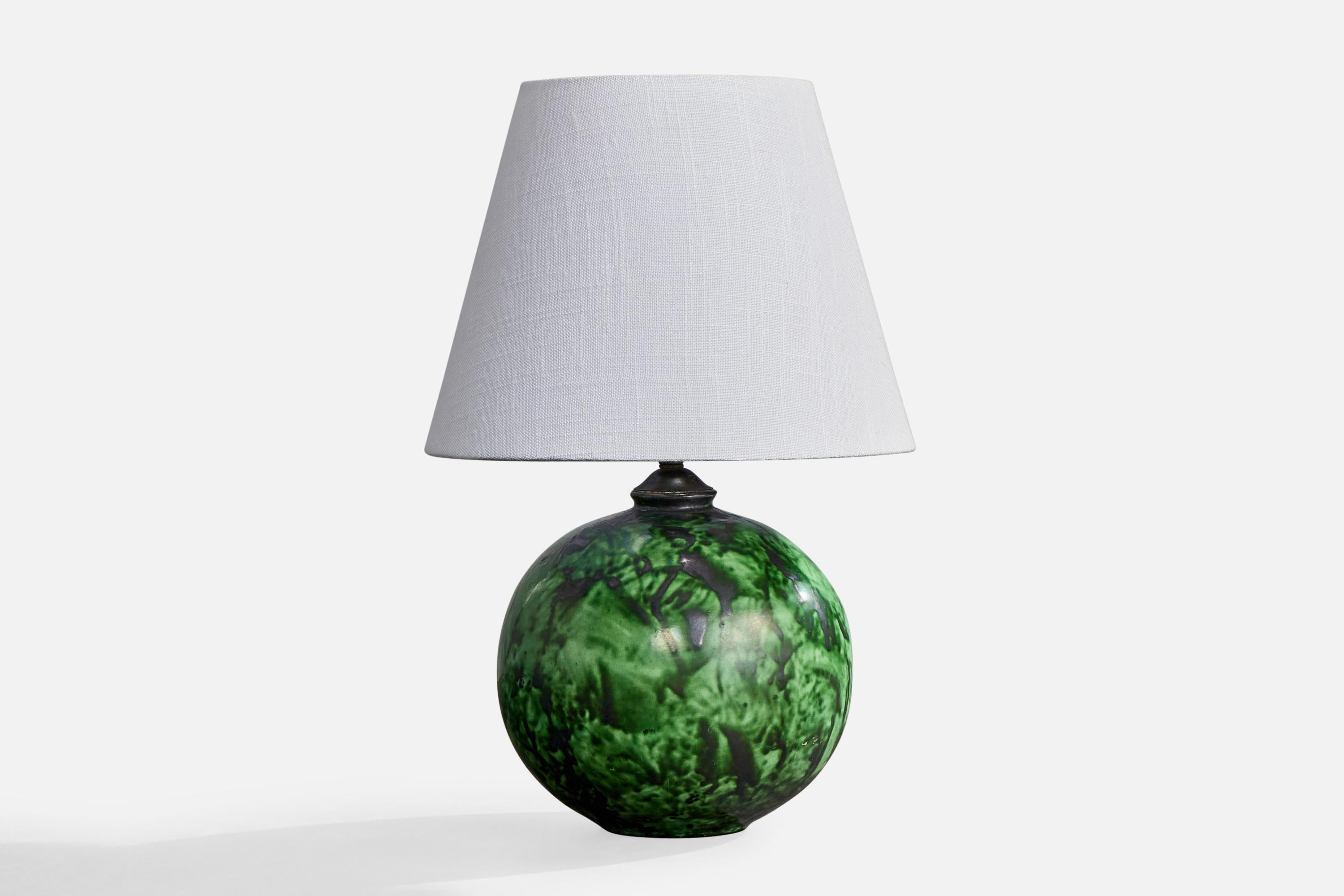 A green-painted ceramic and brass table lamp designed by Erik Mornils and produced by Nittsjö, Sweden, c. 1930s.

Dimensions of Shade (inches): 6” Top Diameter x 10” Bottom Diameter x 7.5” Height

Dimensions of Lamp with Shade (inches): 15.5” Height