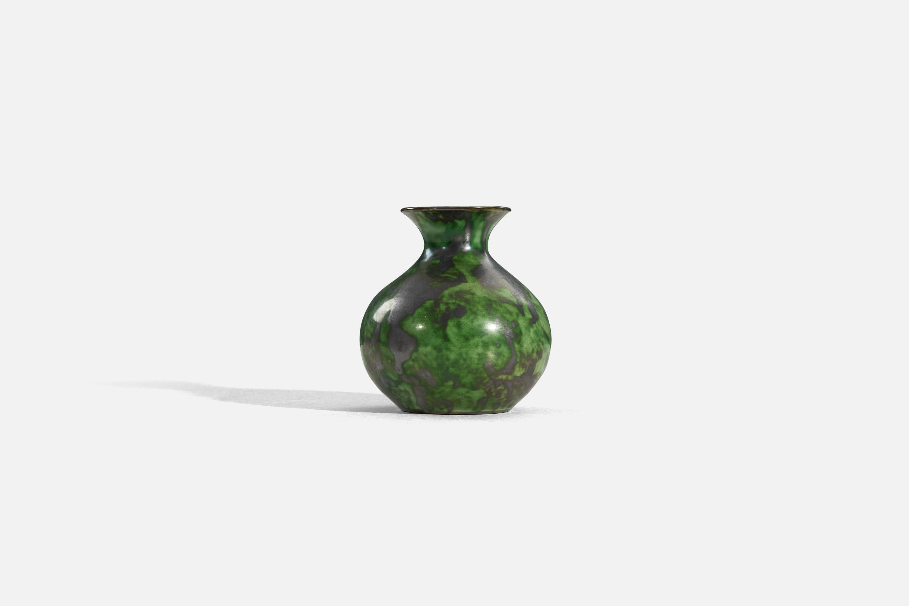 A green-glazed earthenware vase designed by Erik Mornils and produced by Nittsjö, Sweden, 1940s.

