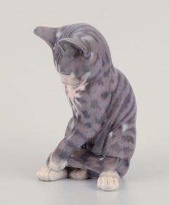 Erik Nielsen for Royal Copenhagen. Porcelain figurine of gray striped cat.
