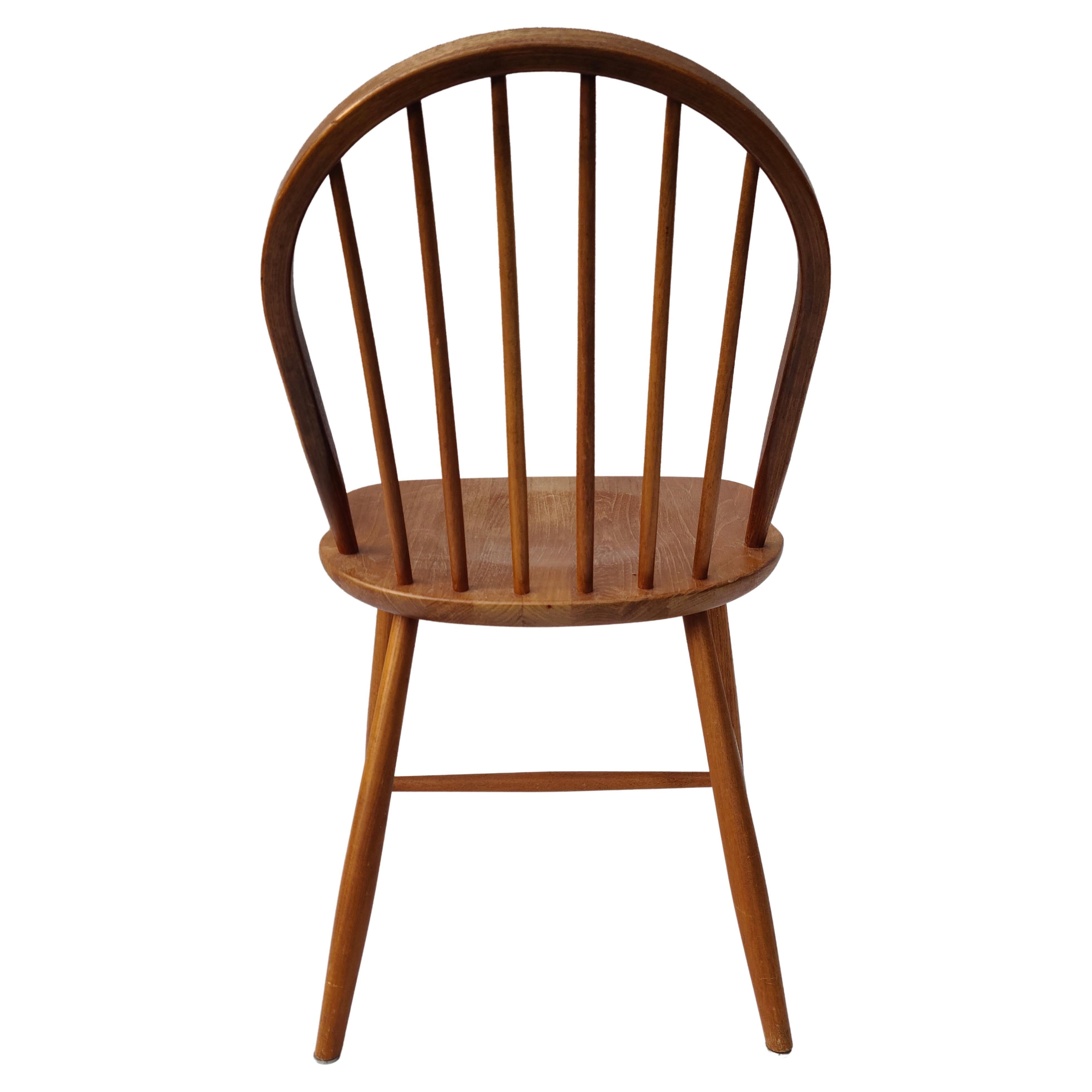  Sedia da pranzo in teak.
Progettato da Erik Ole Jorgensen.
Prodotto in Danimarca.