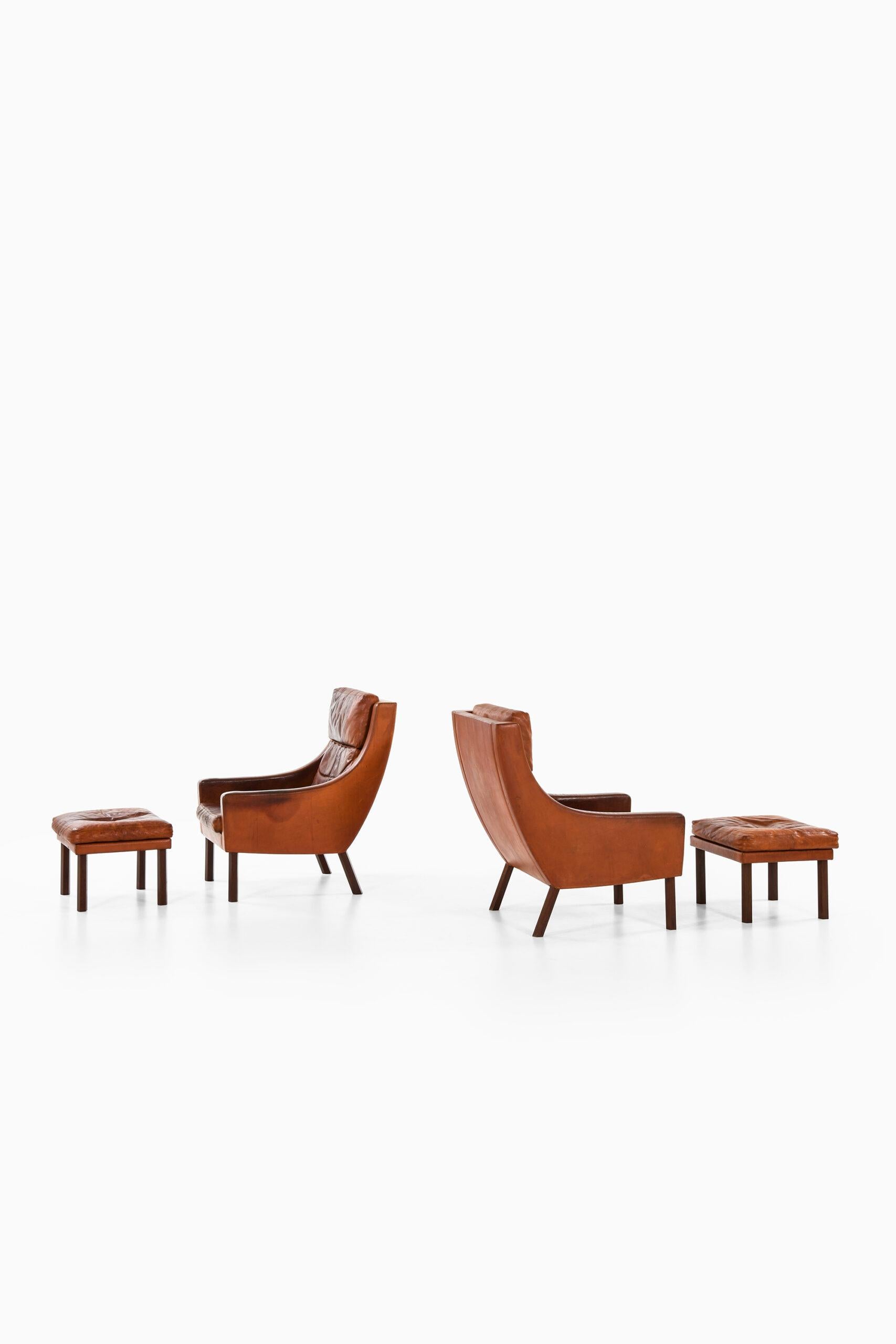 Mid-20th Century Erik Ole Jørgensen Easy Chairs with Stools Produced by Selectform in Denmark For Sale