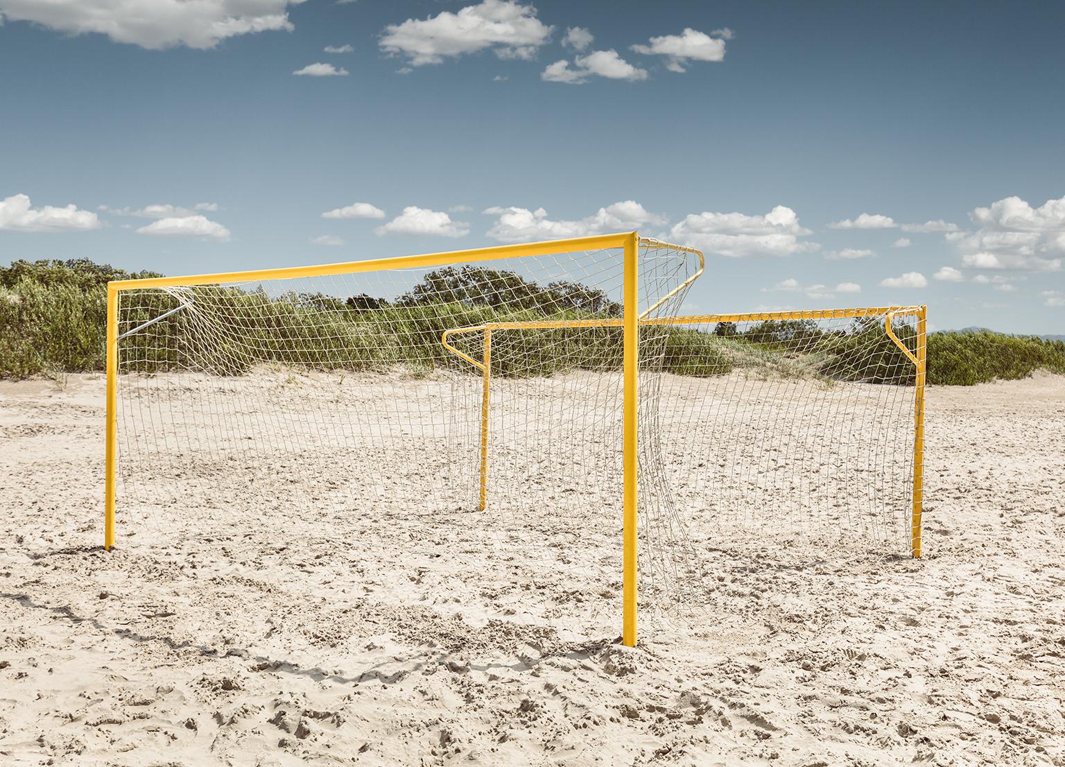 Erik Pawassar Color Photograph - Beach Goals - large format photograph of iconic yellow soccer goals