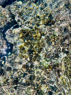 Arrecife de coral - fotografía de gran formato de los reflejos del sol en un arrecife de coral