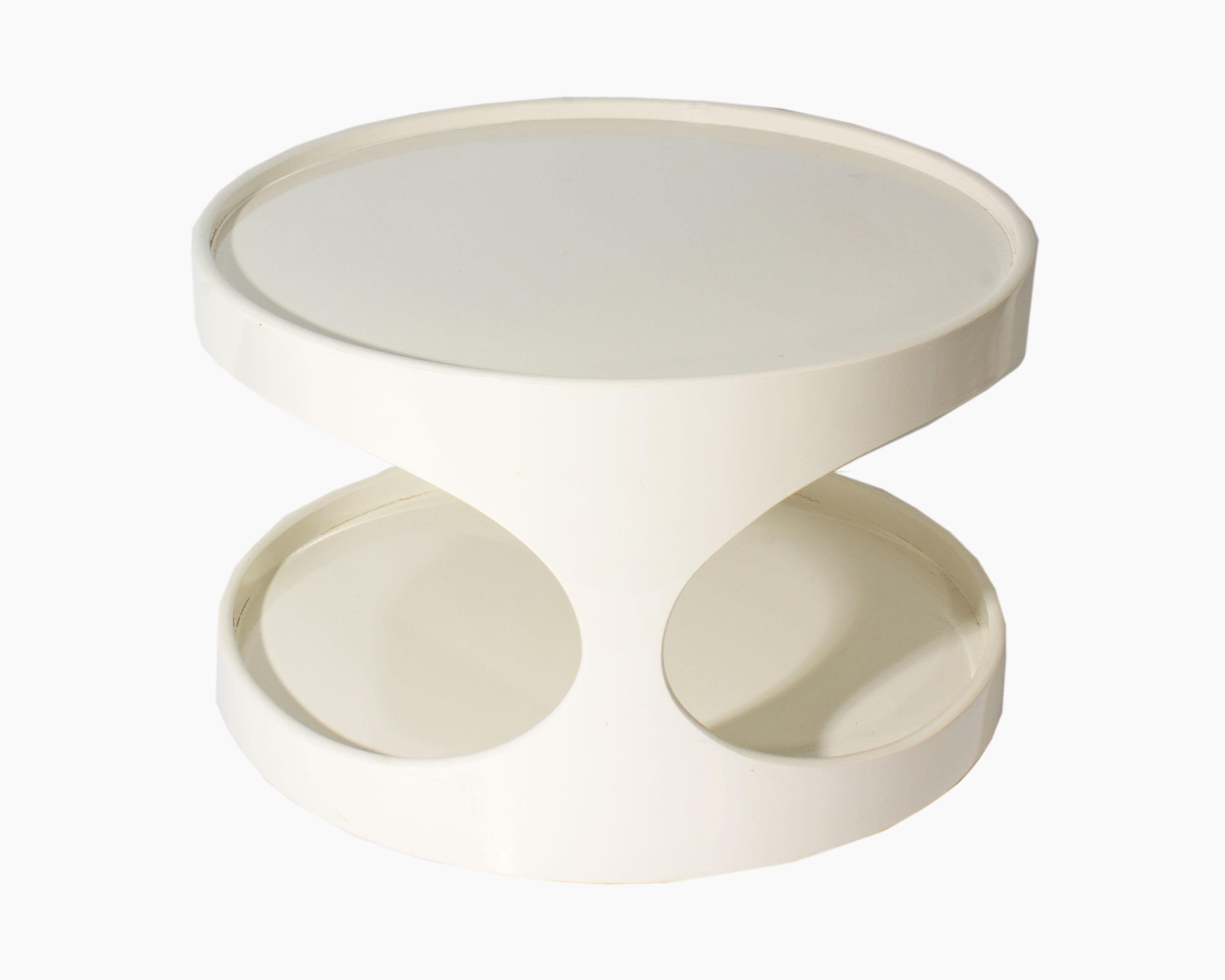 A Nebu Holland Space Age accent table by designer Erik Van Buijtenen. White in color and marked verso, this accent table is representative of Van Buijtenen's well known design for Nebu. The table is open in the middle, allowing for additional