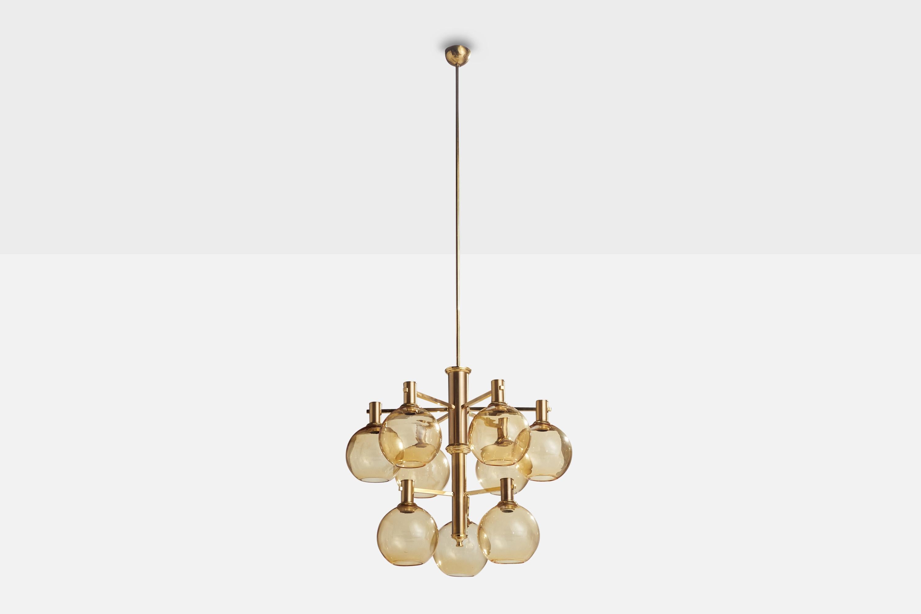 A sizeable brass and blown yellow glass chandelier designed by Erik Wärnå and produced by EWÅ Värnamo, Sweden, 1960s.

Dimensions of canopy (inches): 3.25” H x 4.25Diameter
Socket takes standard E-26 bulbs. 9 sockets.There is no maximum wattage