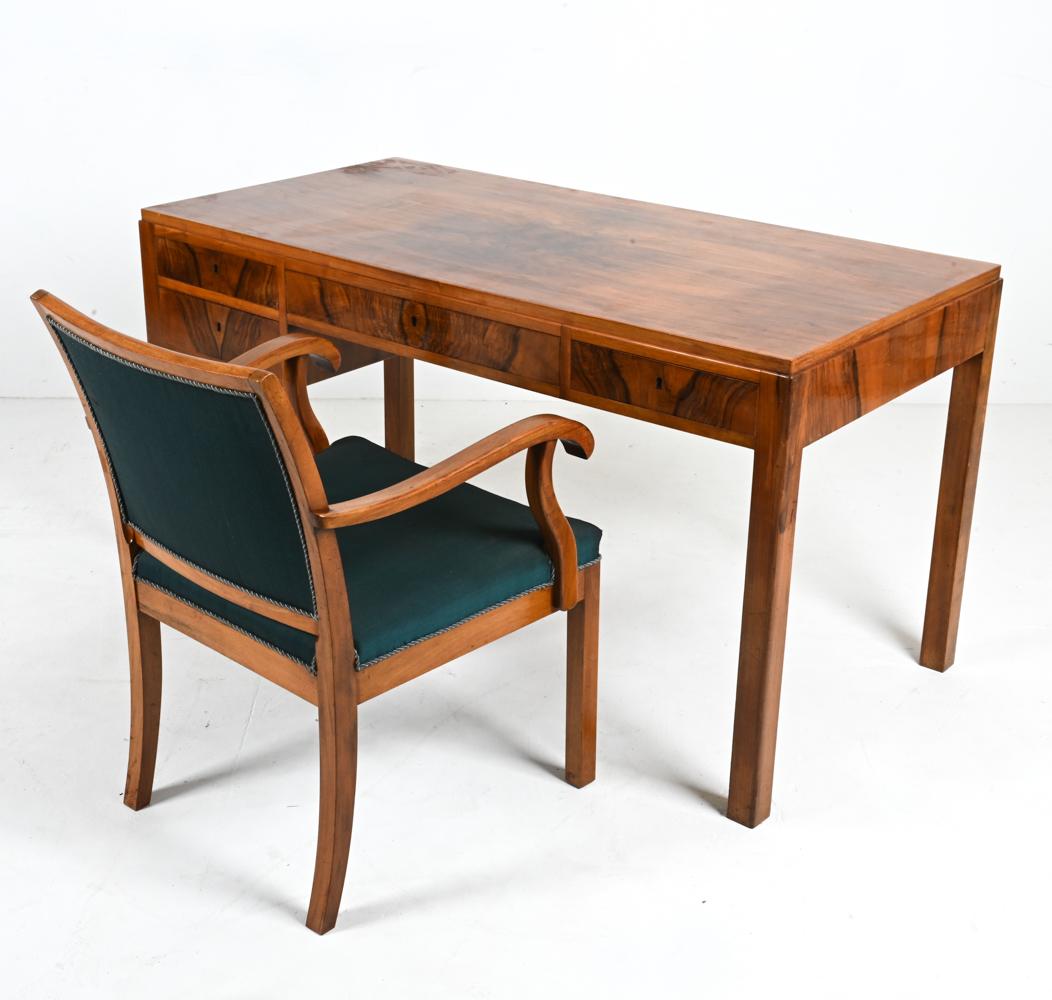 Dive into a realm of unparalleled craftsmanship and timeless elegance with this rare Erik Wørts Danish Mid-Century Rosewood Desk and Armchair ensemble. A true embodiment of 20th-century Scandinavian design at its zenith, this set captures the soul