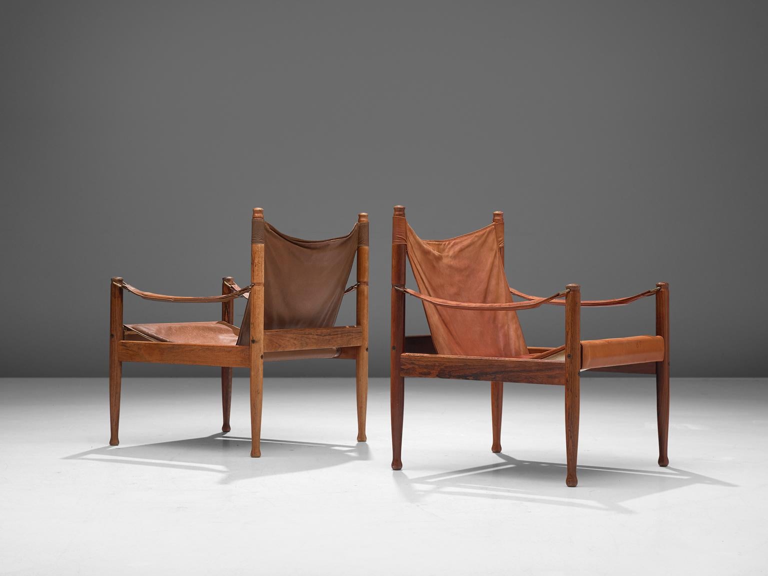 Erik Wørts for Niels Eilsersen, pair of armchairs, rosewood and leather, Denmark, 1960s. 

These sturdy lounge chairs with refined detail are designed by Danish designer Erik Wørts. The safari easy chairs have a strong expression due to the leather