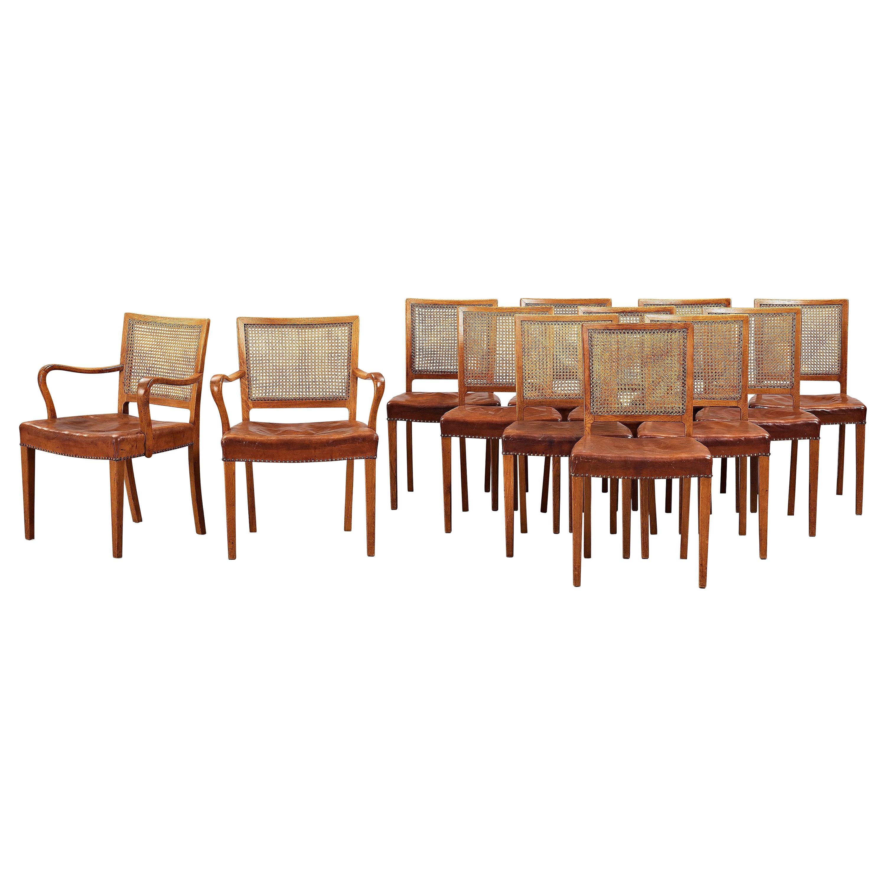 Erik Wørts Set of 12 Dining Chairs in Oak, Cane and Niger Leather, 1945