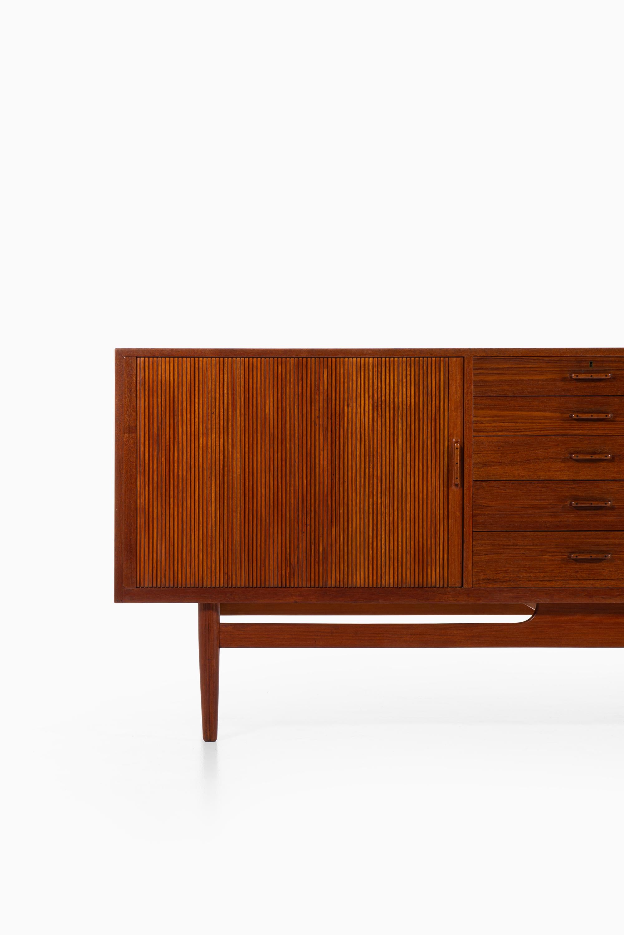 Rare sideboard with tambour doors designed by Erik Wørts. Produced by Wørts møbelsnedkeri in Denmark.