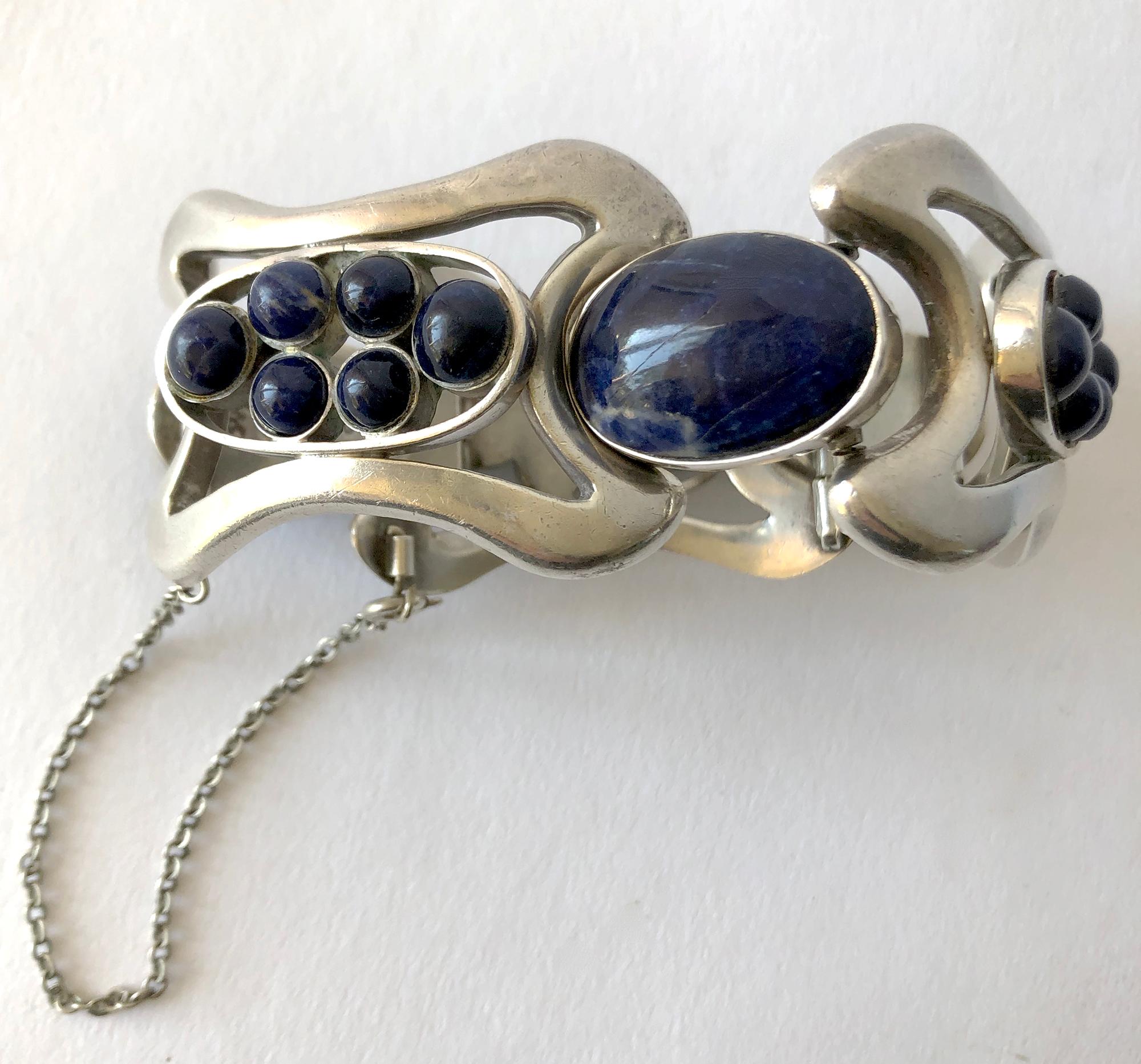 Substantial Mexican modernist sterling silver bracelet with sodalite cabochons created by Erika Hult de Corral of Puerto Vallarta, Mexico. Bracelet measures 1.25