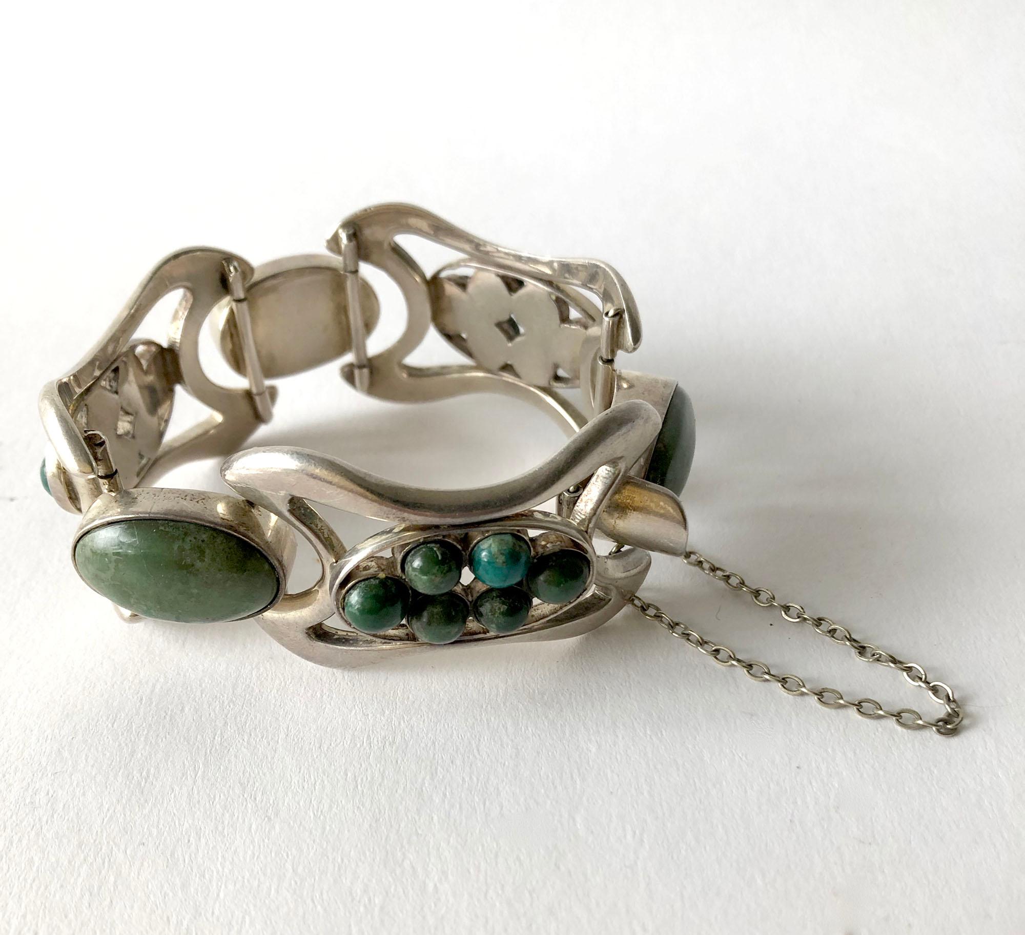 Mexican modernist sterling silver bracelet with Mexican jade cabochons created by Erika Hult de Corral of Puerto Vallarta, Mexico. Bracelet measures 1.25