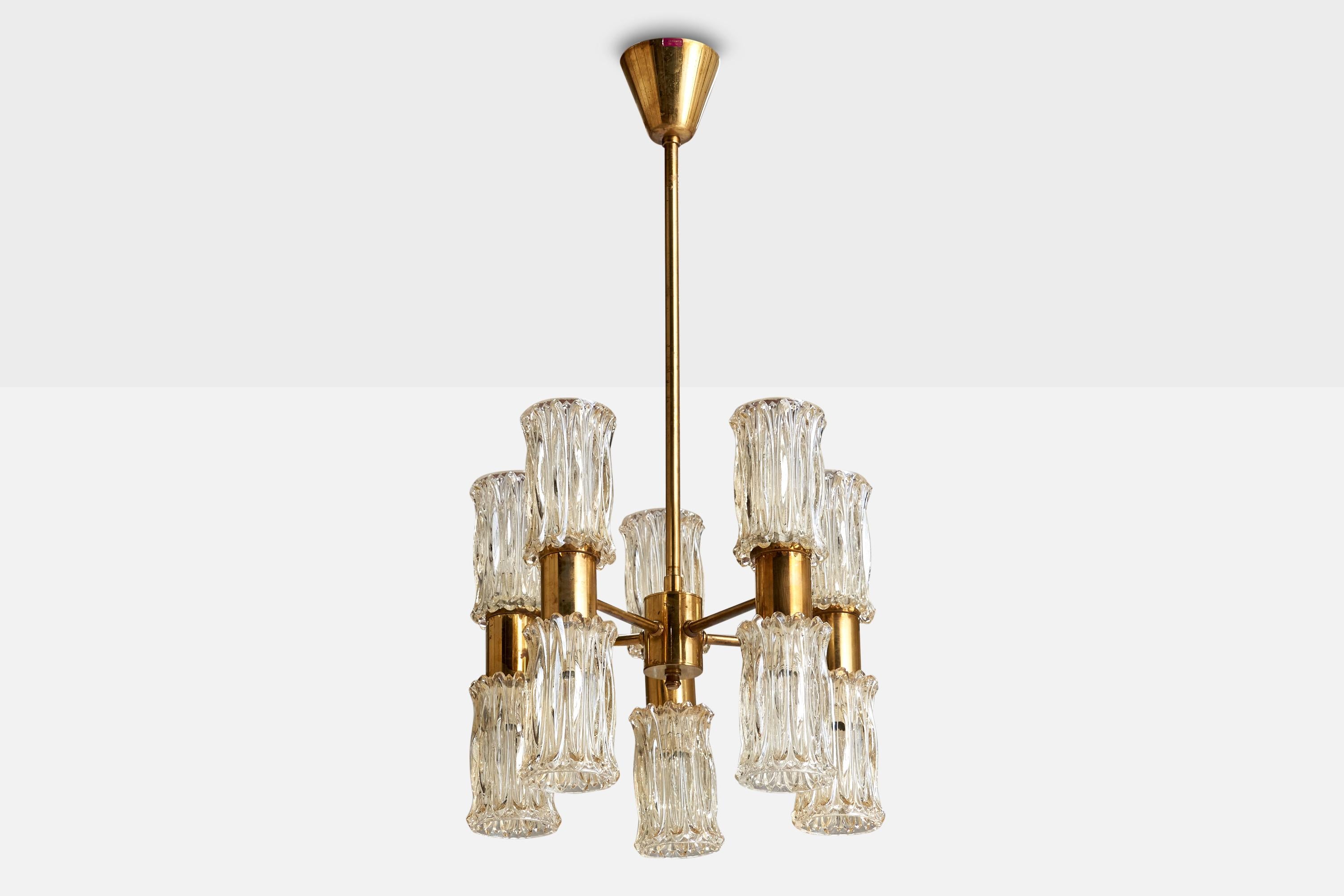 A brass and blown glass chandelier produced by Eriksmåla Glas, Sweden, c. 1950s.

Overall Dimensions (inches): 28” H x  14” Diameter
Dimensions of Canopy:  3.5” H x ” 3.75W 
Stem length: 17.25”H
Bulb Specifications: E-14 Bulbs
Number of Sockets: