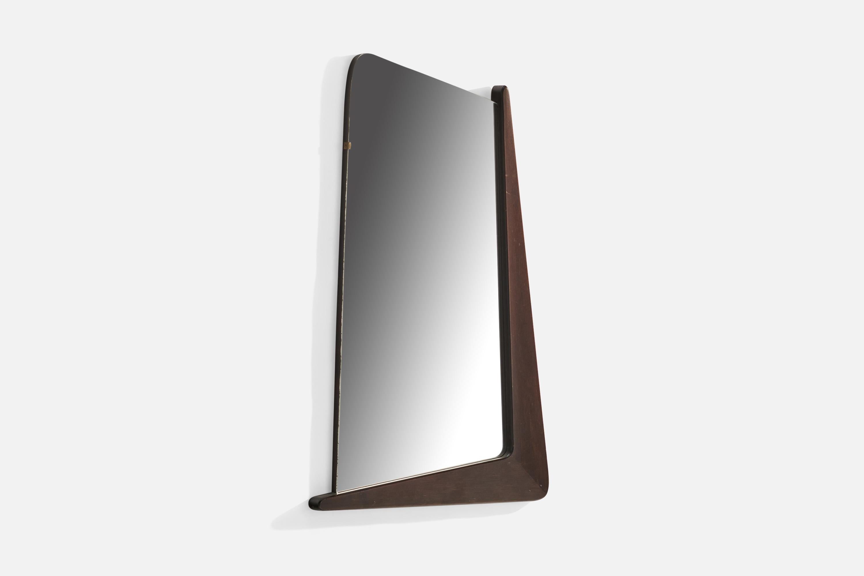 A stained walnut freeform mirror designed and produced by Eriksmåla Glas, Sweden, c. 1950s.