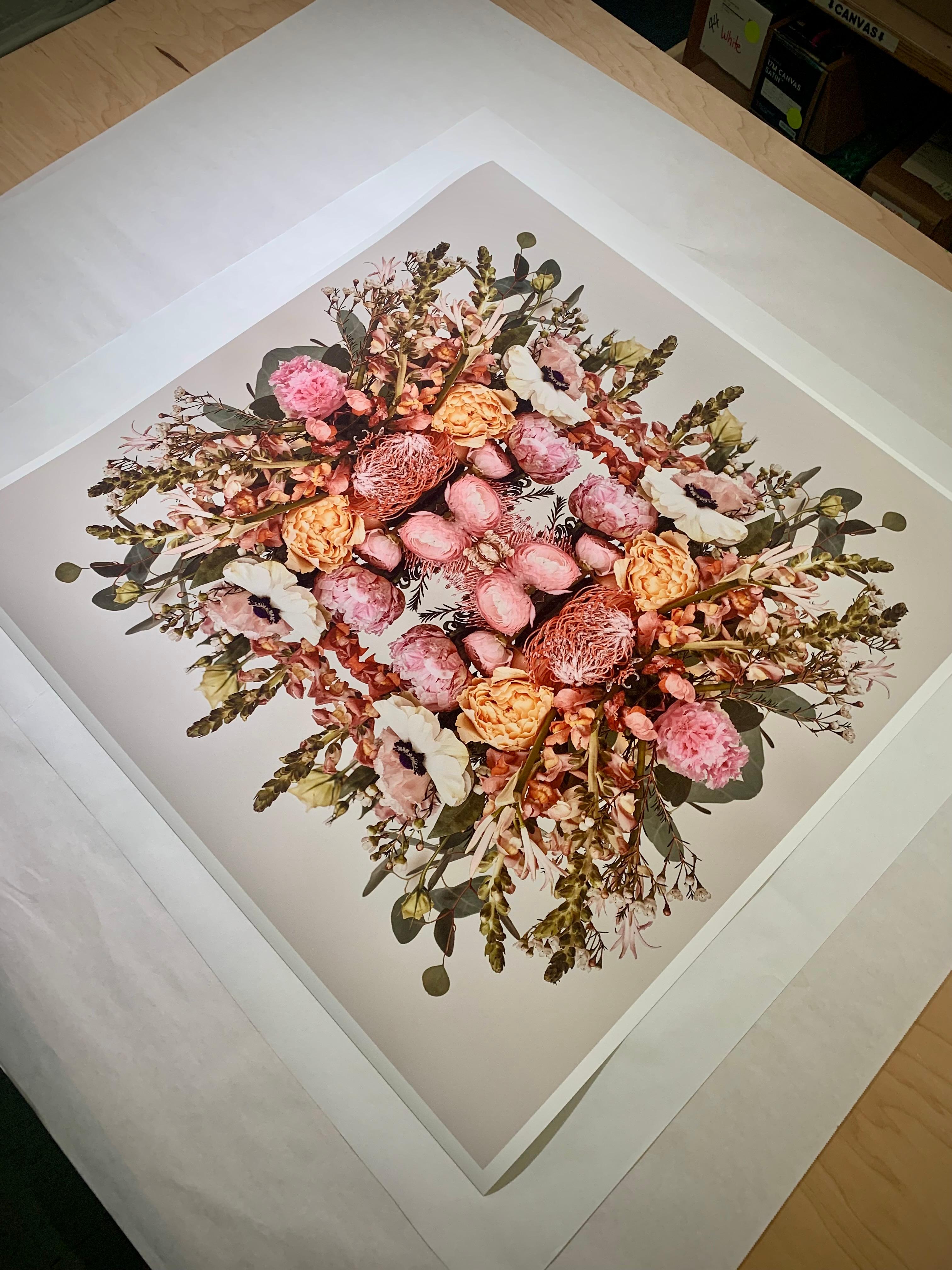 This print features the playful relationship between natural forms and botanicals. In this image Erin uses the natural composition of the pink, orange, white and green flowers, and her own collage work, to create a hypnotic mandala with the floral.