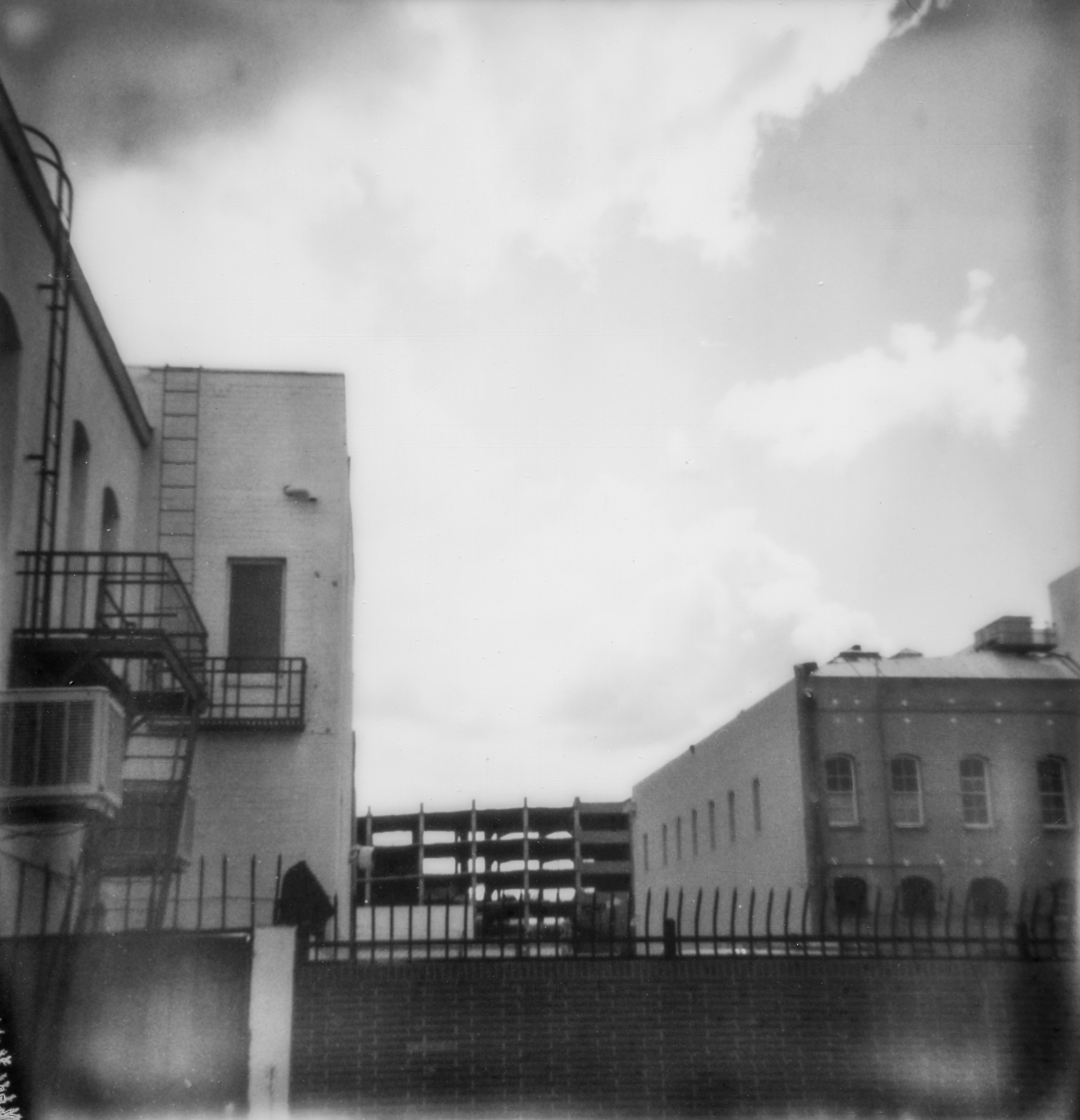 Erin Dougherty Black and White Photograph - City Sky (Ghost Town) - 21st Century, Polaroid, Landscape