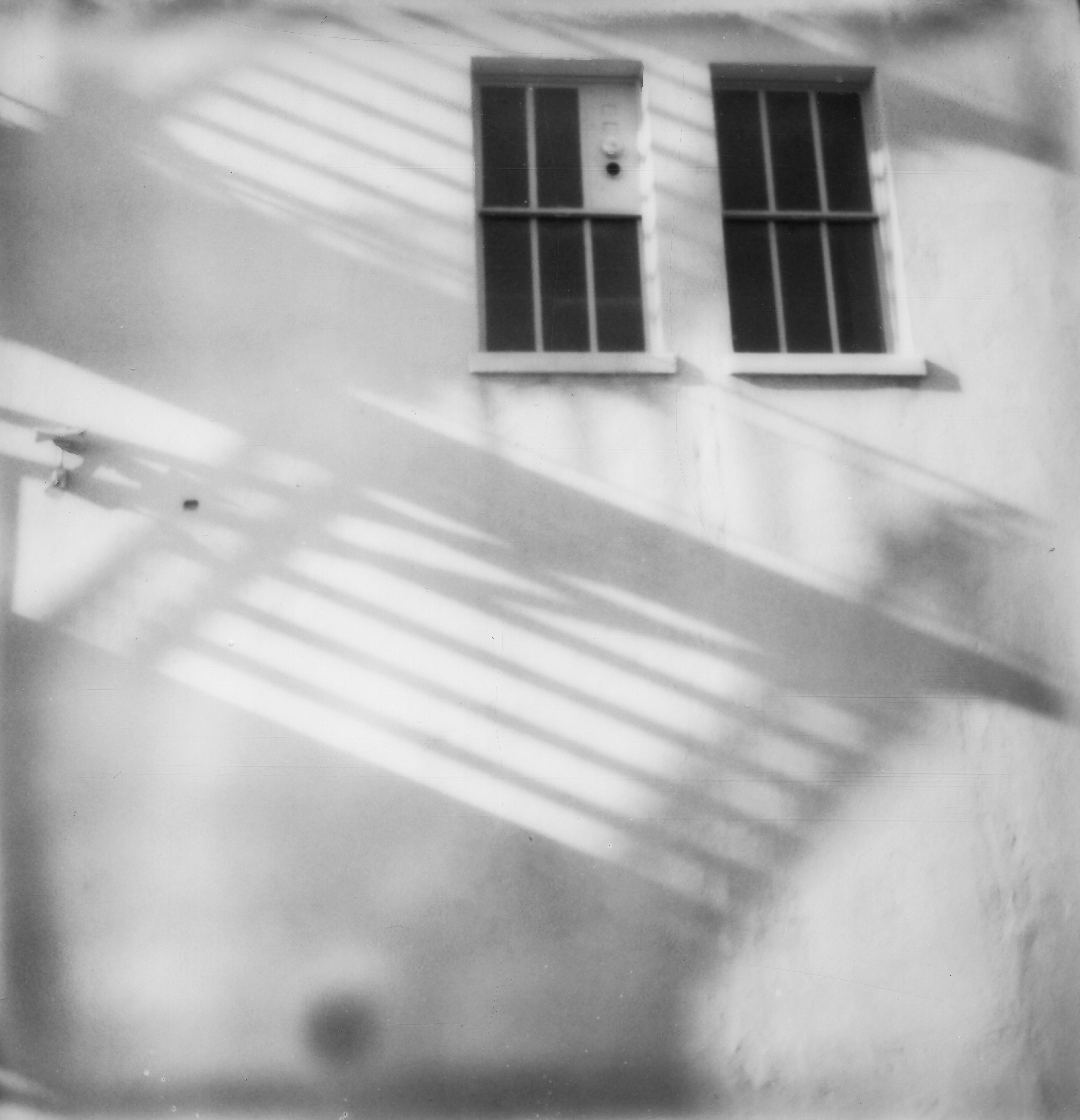 Erin Dougherty Black and White Photograph - Light and Shadow (Ghost Town) - 21st Century, Polaroid, Landscape