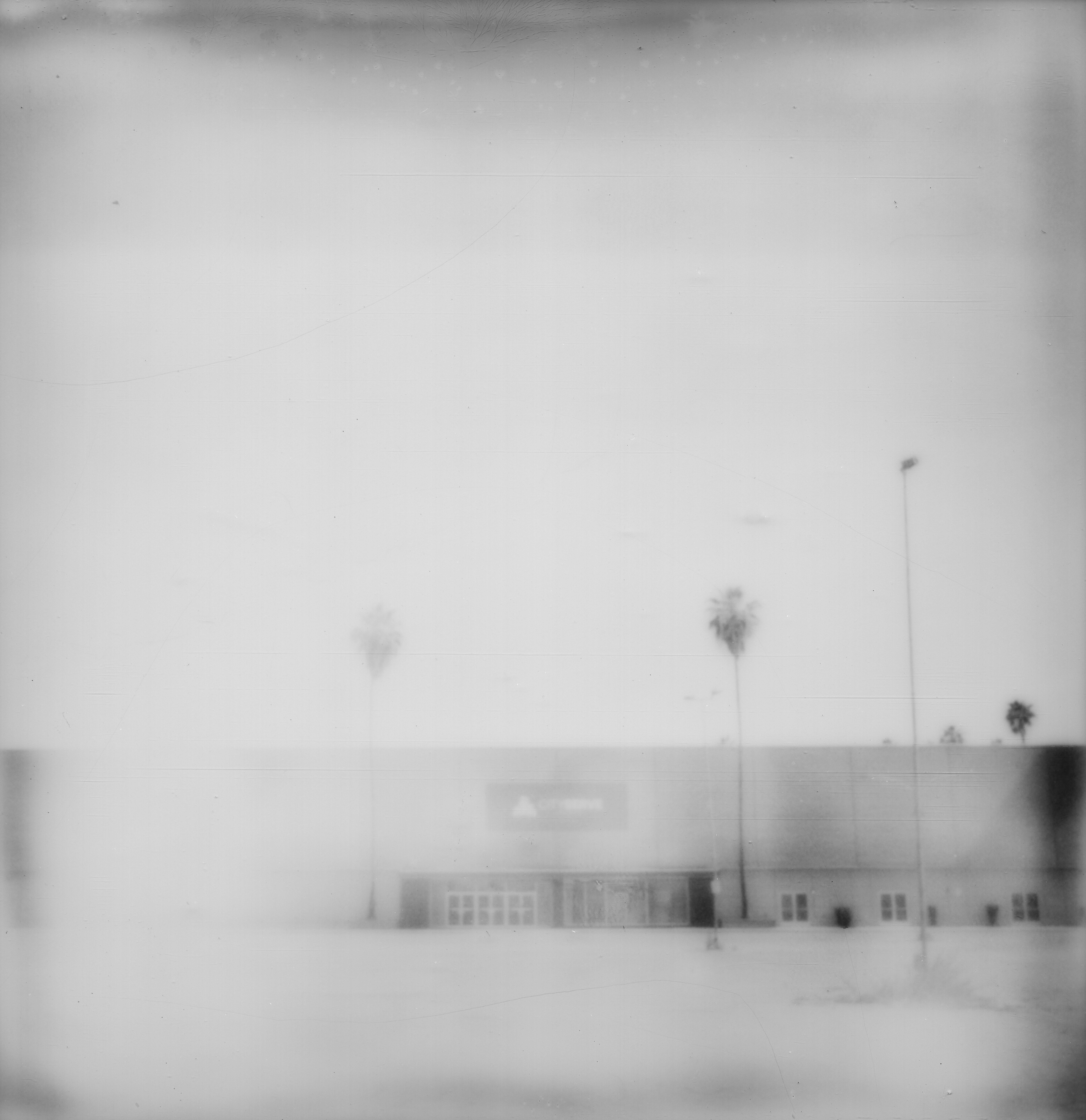 Erin Dougherty Black and White Photograph - Serve (Ghost Town) - 21st Century, Polaroid, Landscape