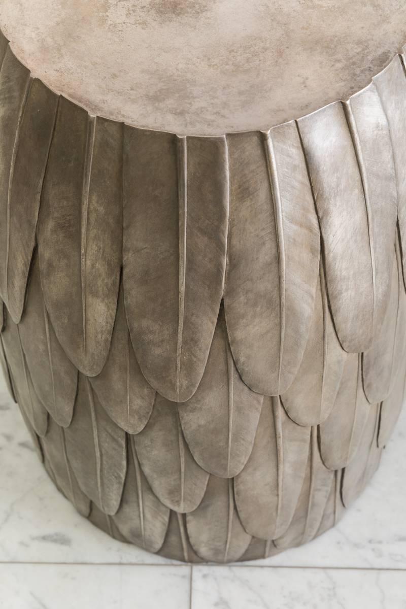 Hundreds of feathers were molded and sculpted to create Silver Nitrate Feather, a work that is at once a functional object and a unique free-standing sculpture. The density of the work’s material elegantly contrasts with the lightness of the